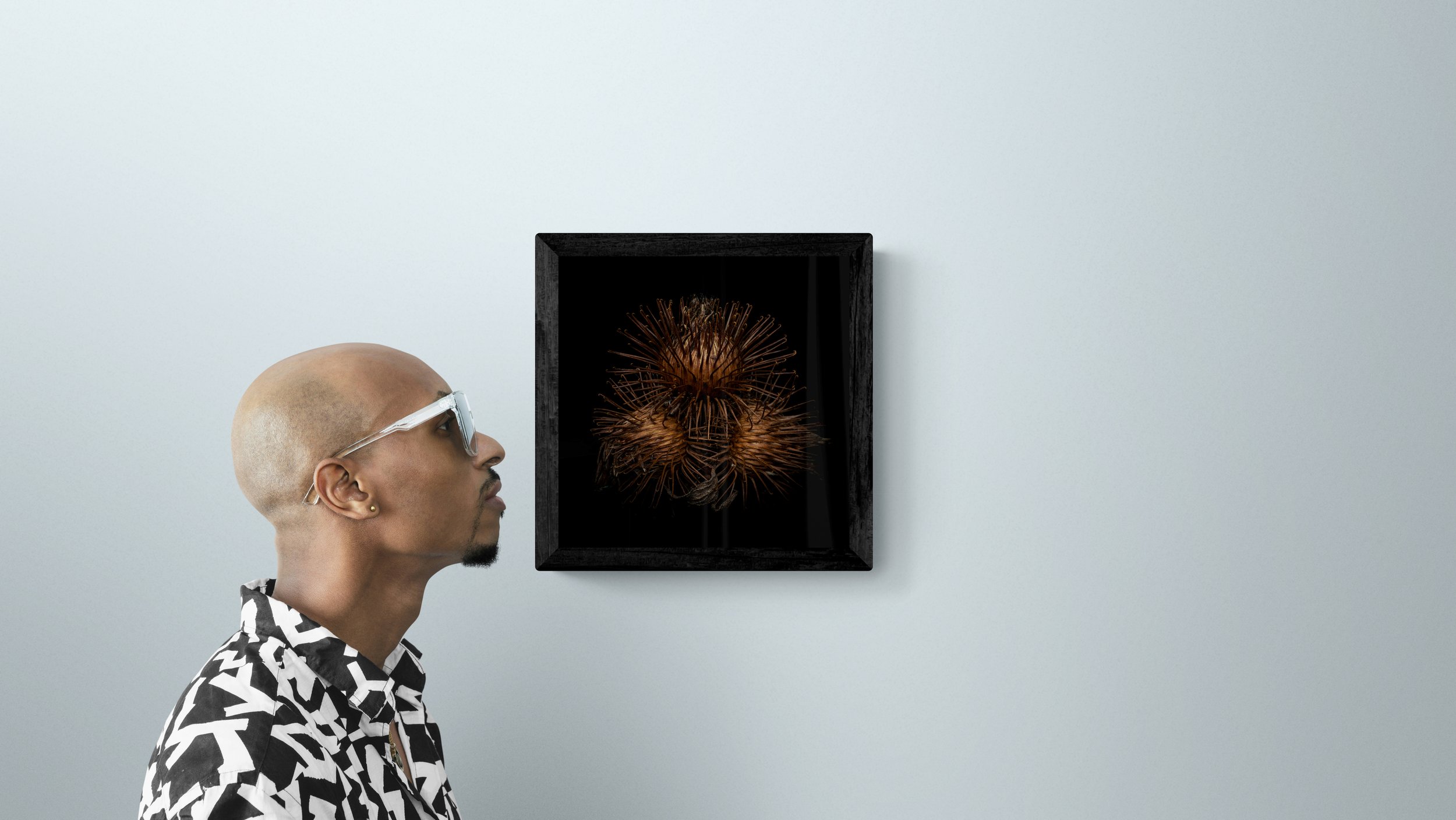 man-standing-next-to-a-gallery-wall-65.jpg