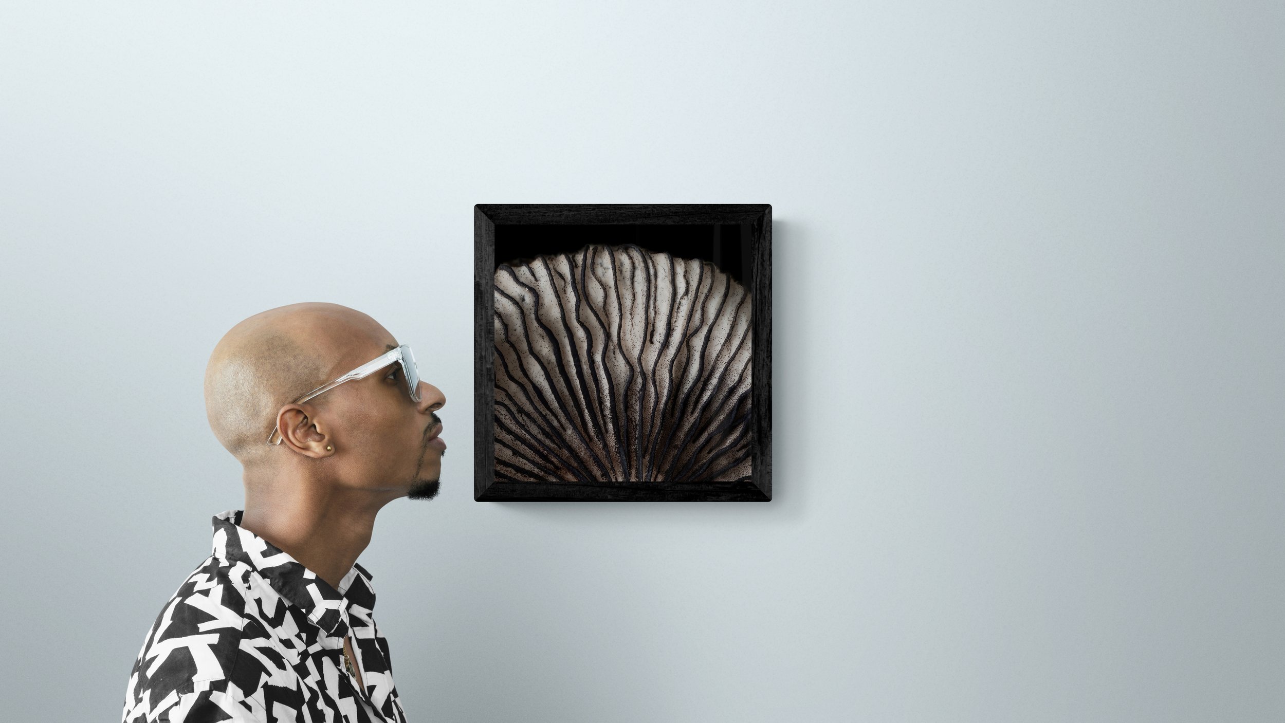 man-standing-next-to-a-gallery-wall-54.jpg