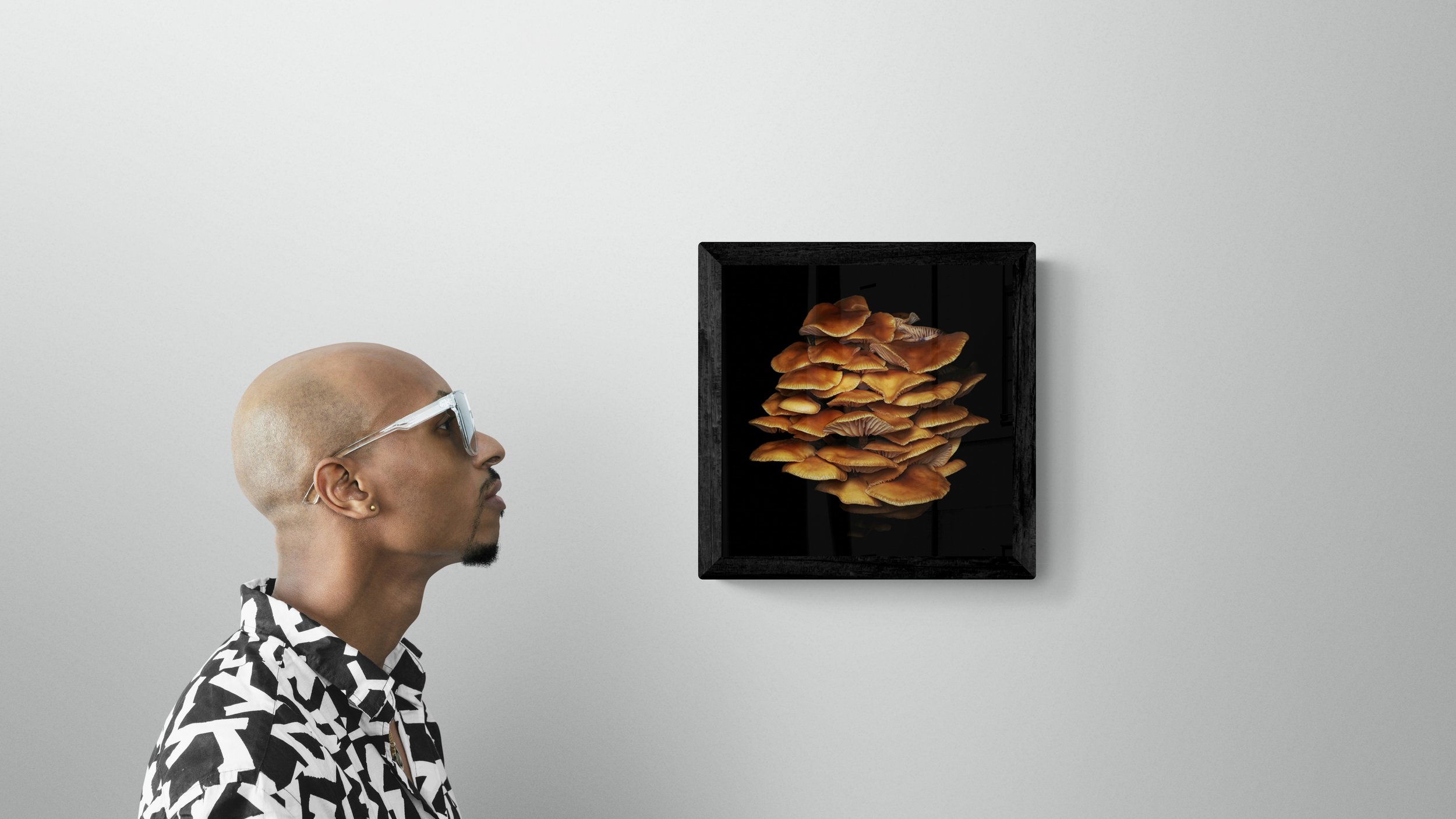 man-standing-next-to-a-gallery-wall-3.jpg