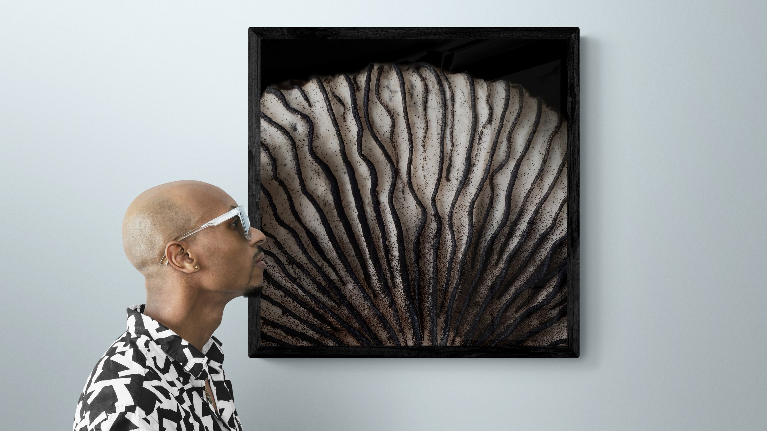 man-standing-next-to-a-gallery-wall-52.jpg