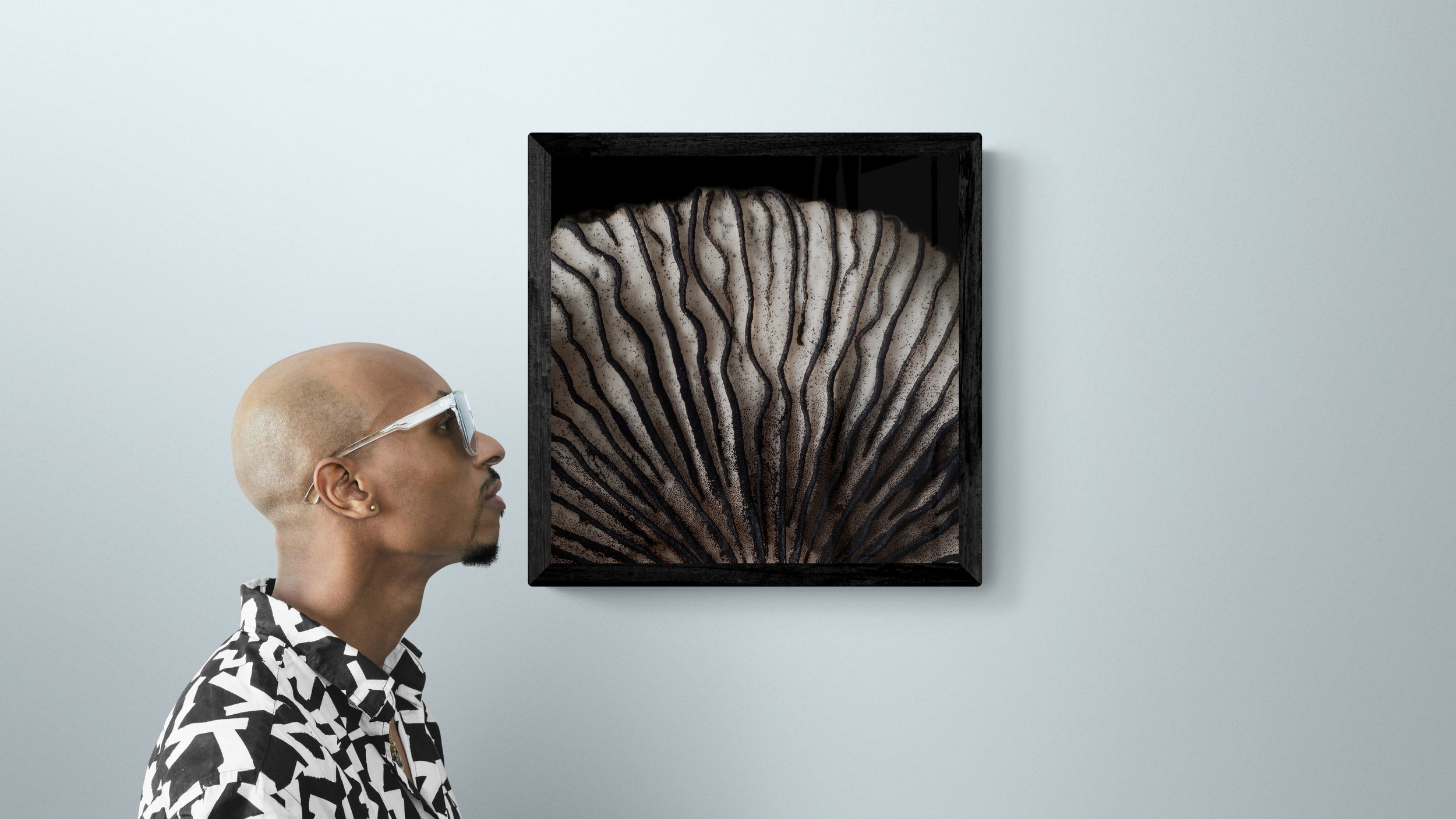 man-standing-next-to-a-gallery-wall-53.jpg