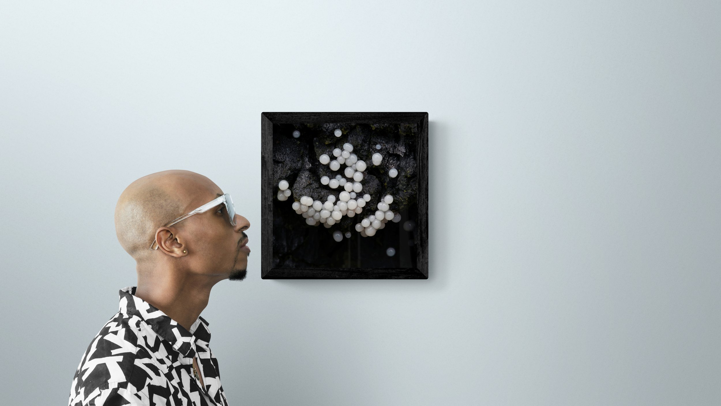 man-standing-next-to-a-gallery-wall-75.jpg