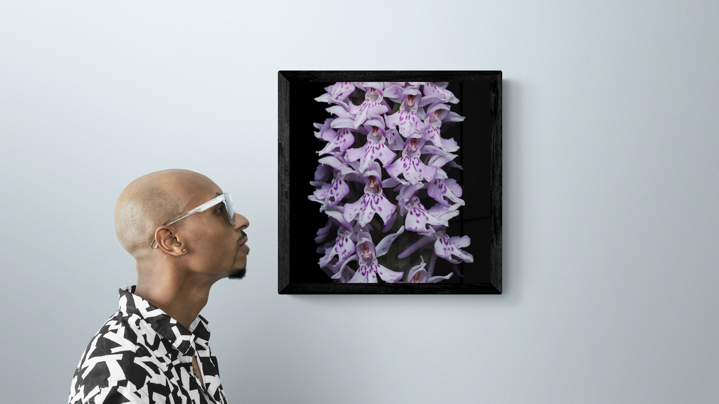 man-standing-next-to-a-gallery-wall-11.jpg