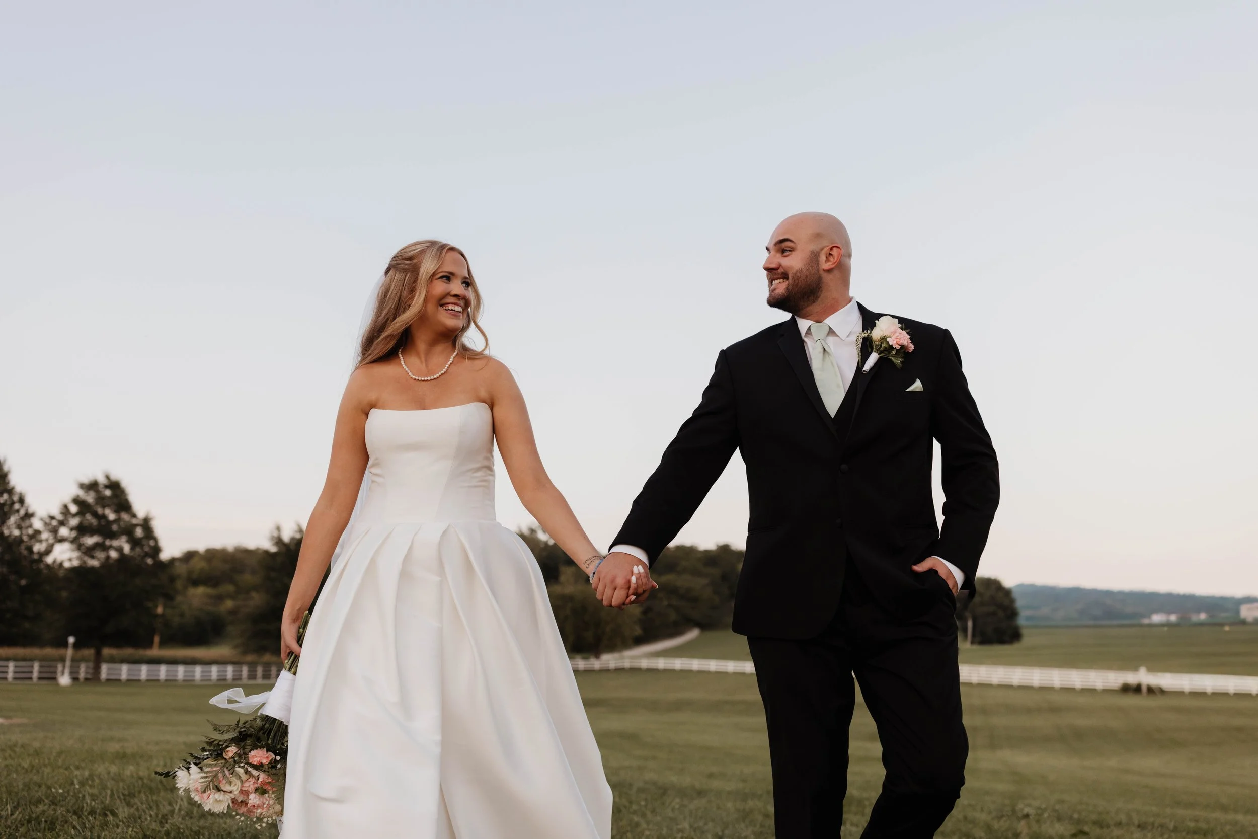 katherinemariephotography captured this stunning couple at their August 2025 wedding with the prettiest clear sky