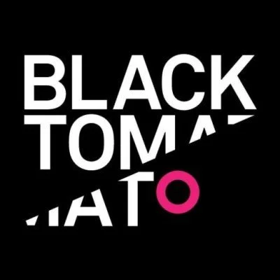 A black background with white and pink text that reads 'BLACK TOMATO' in a stylized, fragmented font.