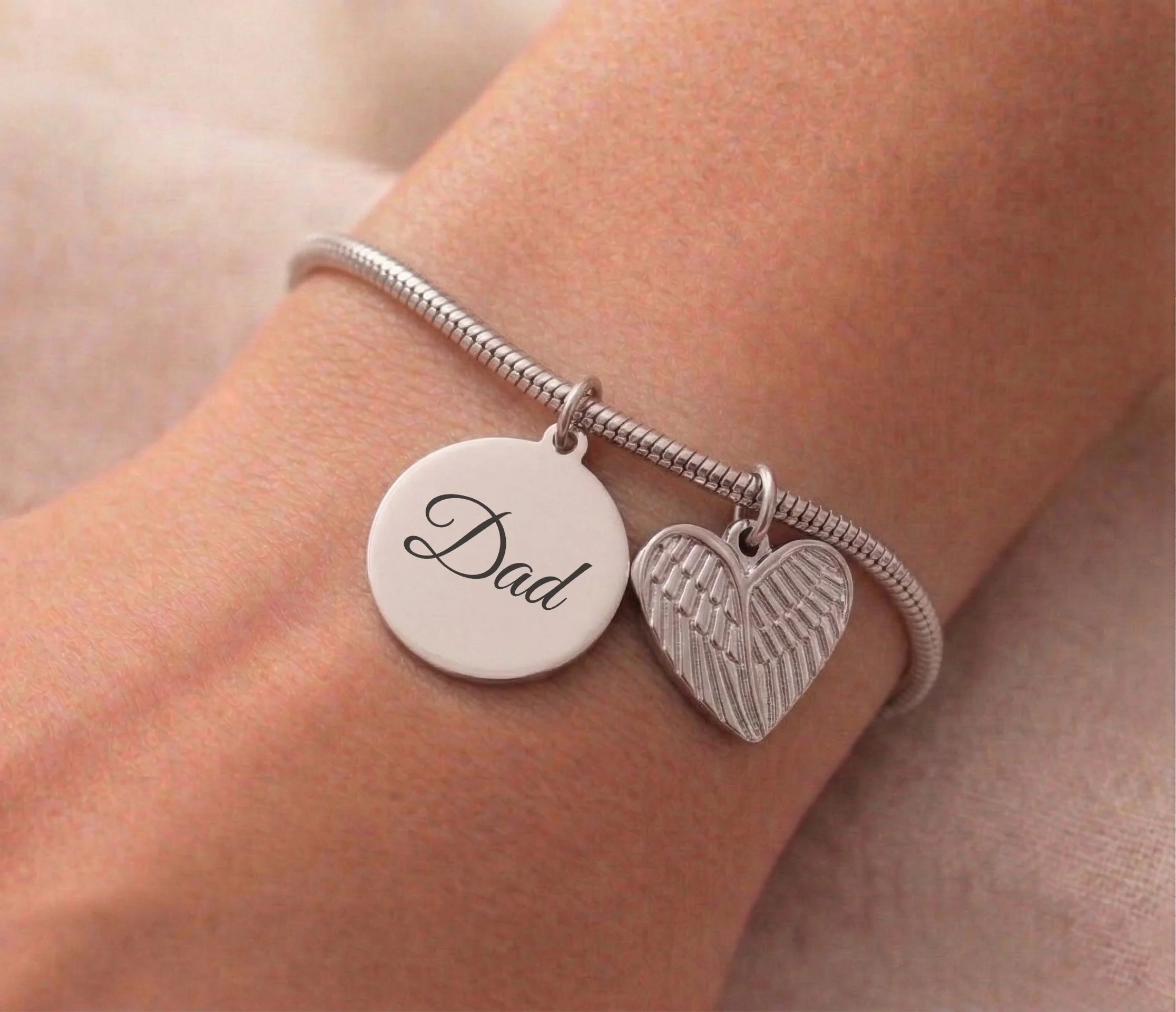 07-M-RoundDoubleHeartWing-Rope-Bracelet copy.jpg