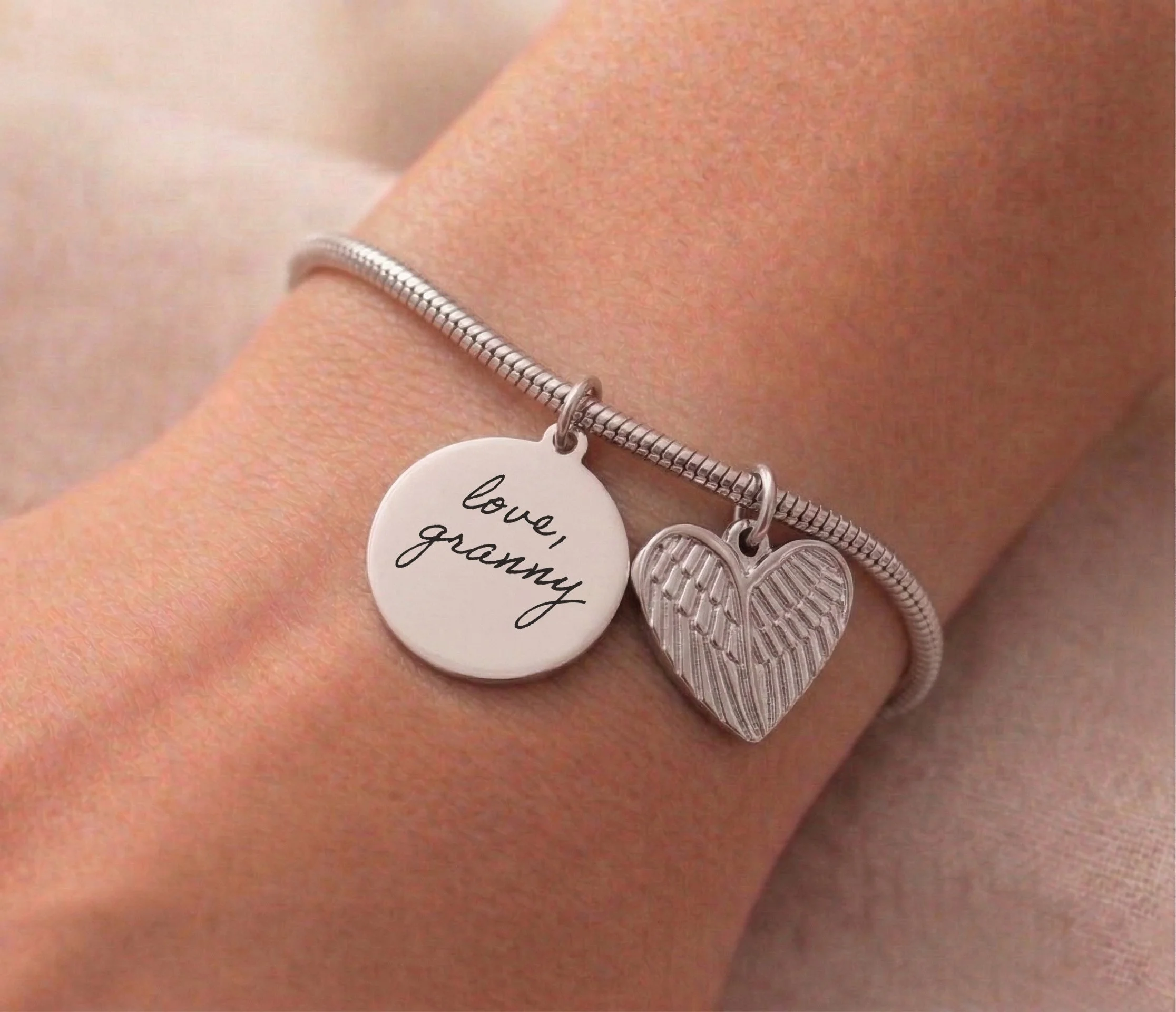 03-H-RoundDoubleHeartWing-Rope-Bracelet copy.jpg