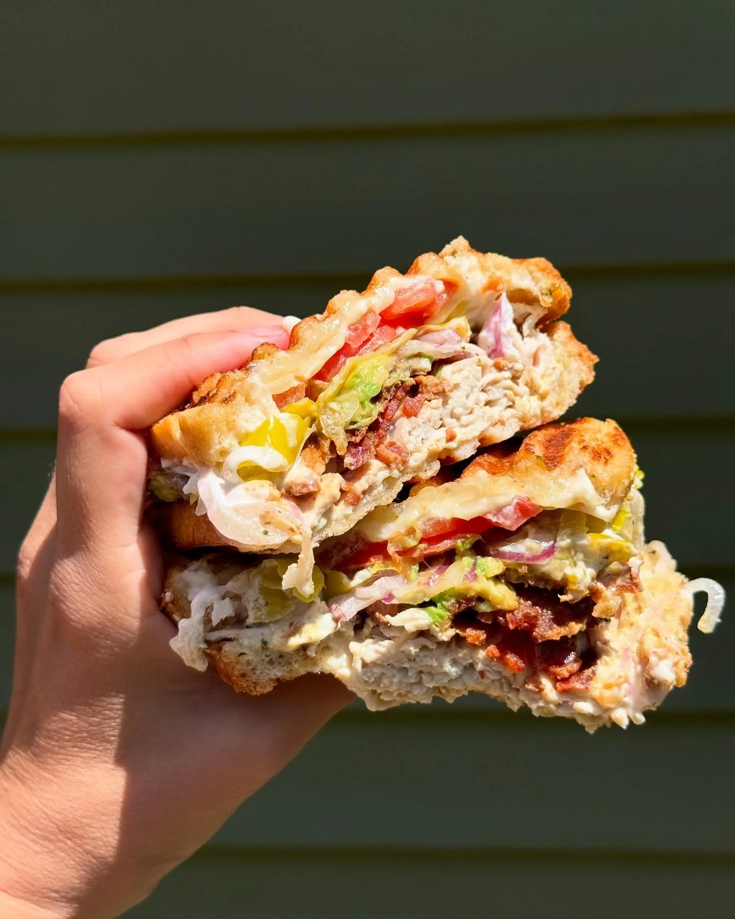 T&rsquo;N A PANINI 

ALL NATURAL ROASTED TURKEY BREAST W/ BACON, SWISS CHEESE, AVOCADO, TOMATO, ONION, PEPPERONCINI, MAYO AND MUSTARD