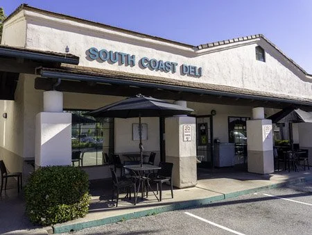 Exterior of South Coast Deli Goleta on South Patterson Avenue with covered outdoor patio seating