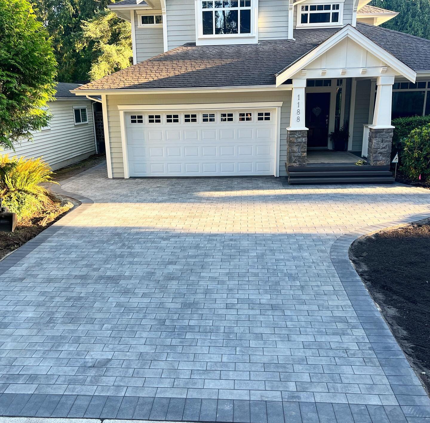 New driveway in pemberton heights installed, excavated and prepped in 3 days. Plus an elegant back patio. #newstone #pavers #mountainscape #howtohardscape #driveway #northvan #lonsdale #westvan #pnw #igers #tbt #vancouver #canada #landscaping #paving