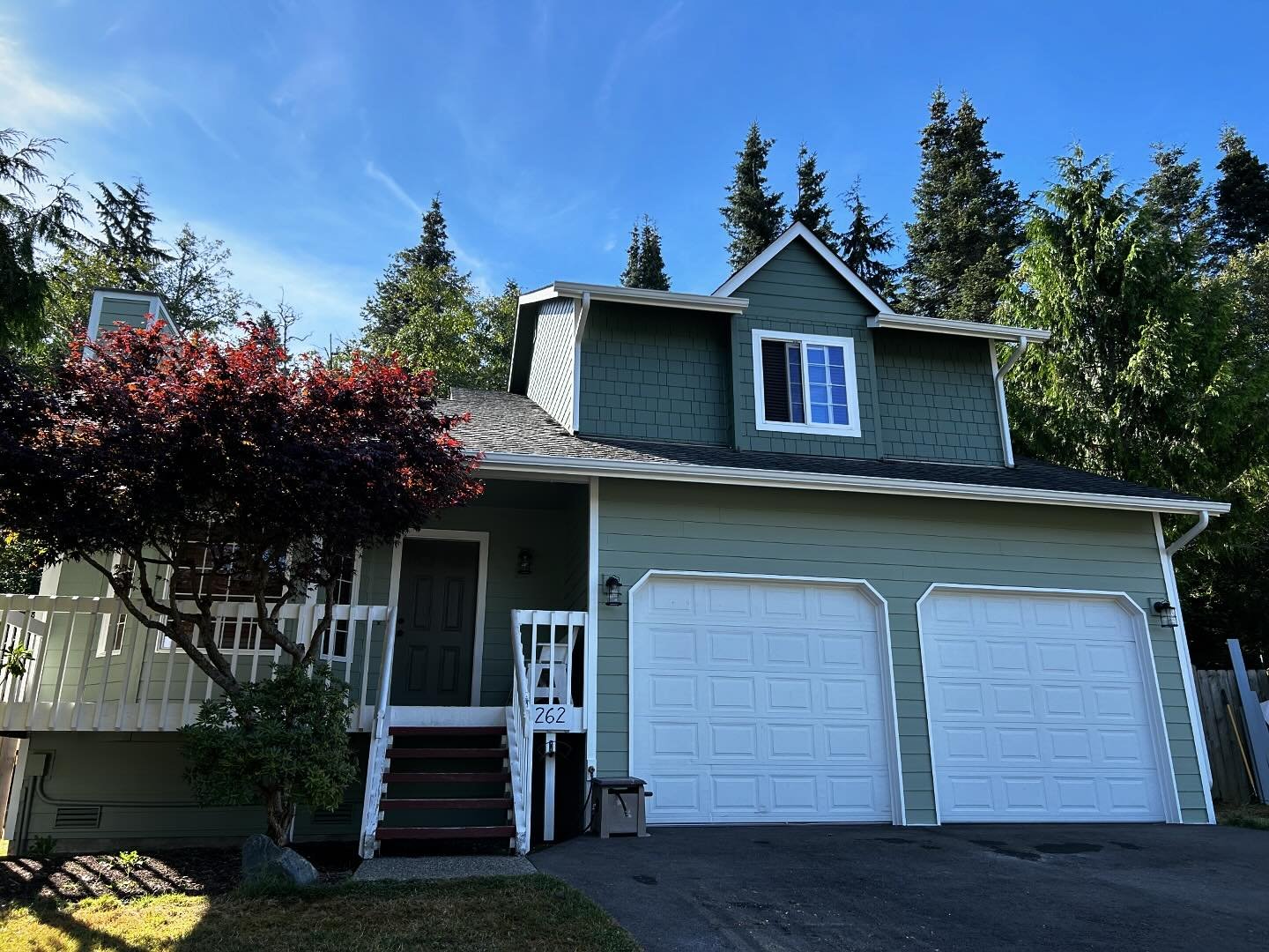 Brand new exterior! We demo&rsquo;d siding, trim, the half circle window, gutters, and man door. We installed new hardie lap siding all the way around with hardie shake for and accent. New hardie soffit, trim and flashing, new man door, and new gutte