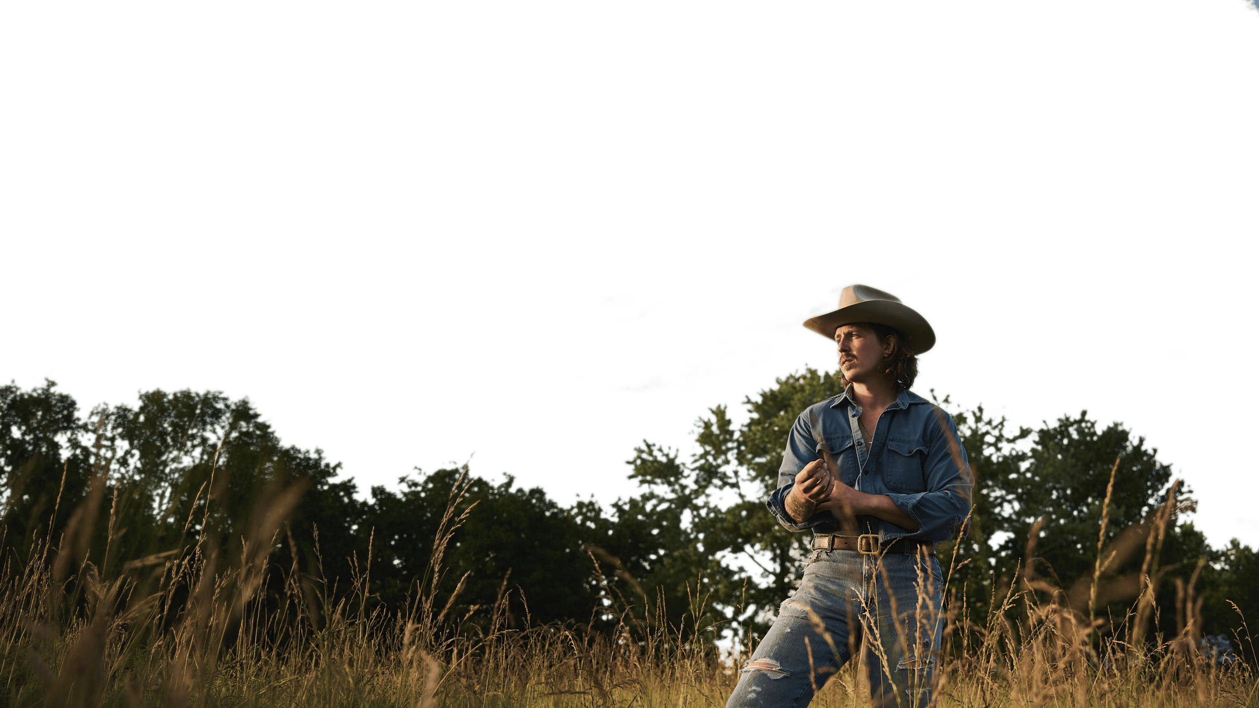 Evan Bartels standing in a field