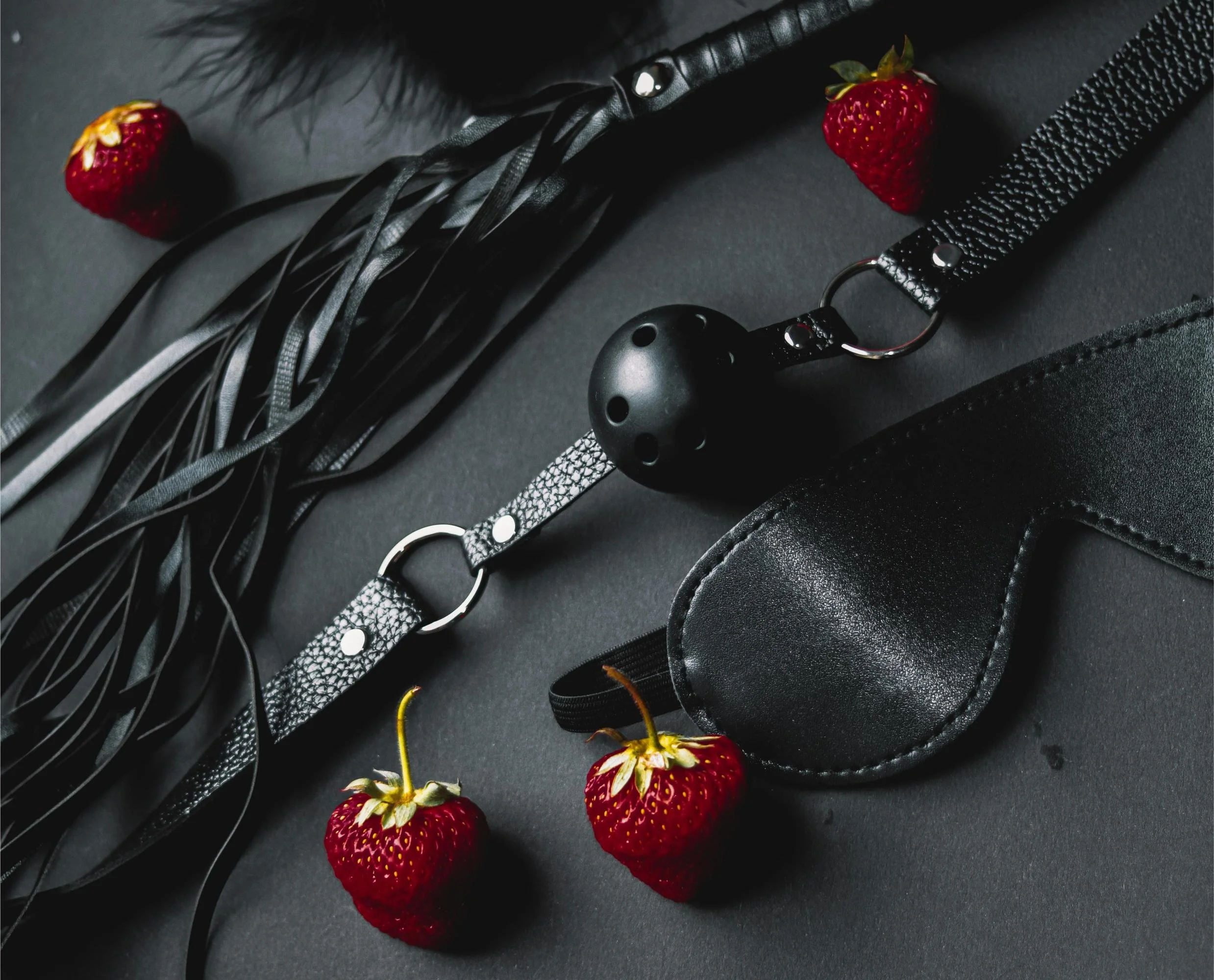 black flogger, mask and ball gag