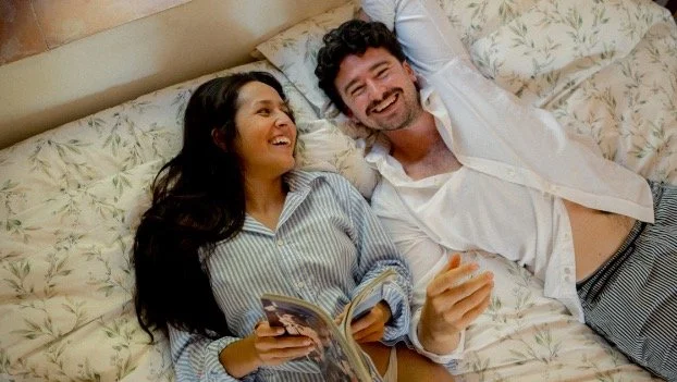 couple laying in bed together