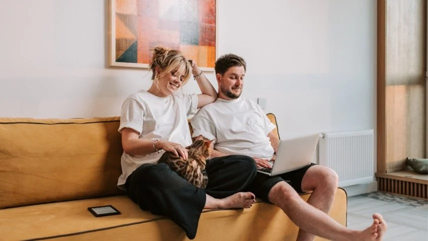 couple sitting together on a couch