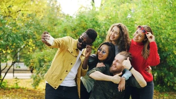 Poly couple taking a photo together