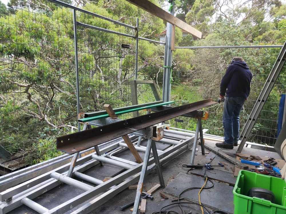  Micheal cleaning and welding west door head out of old angles 