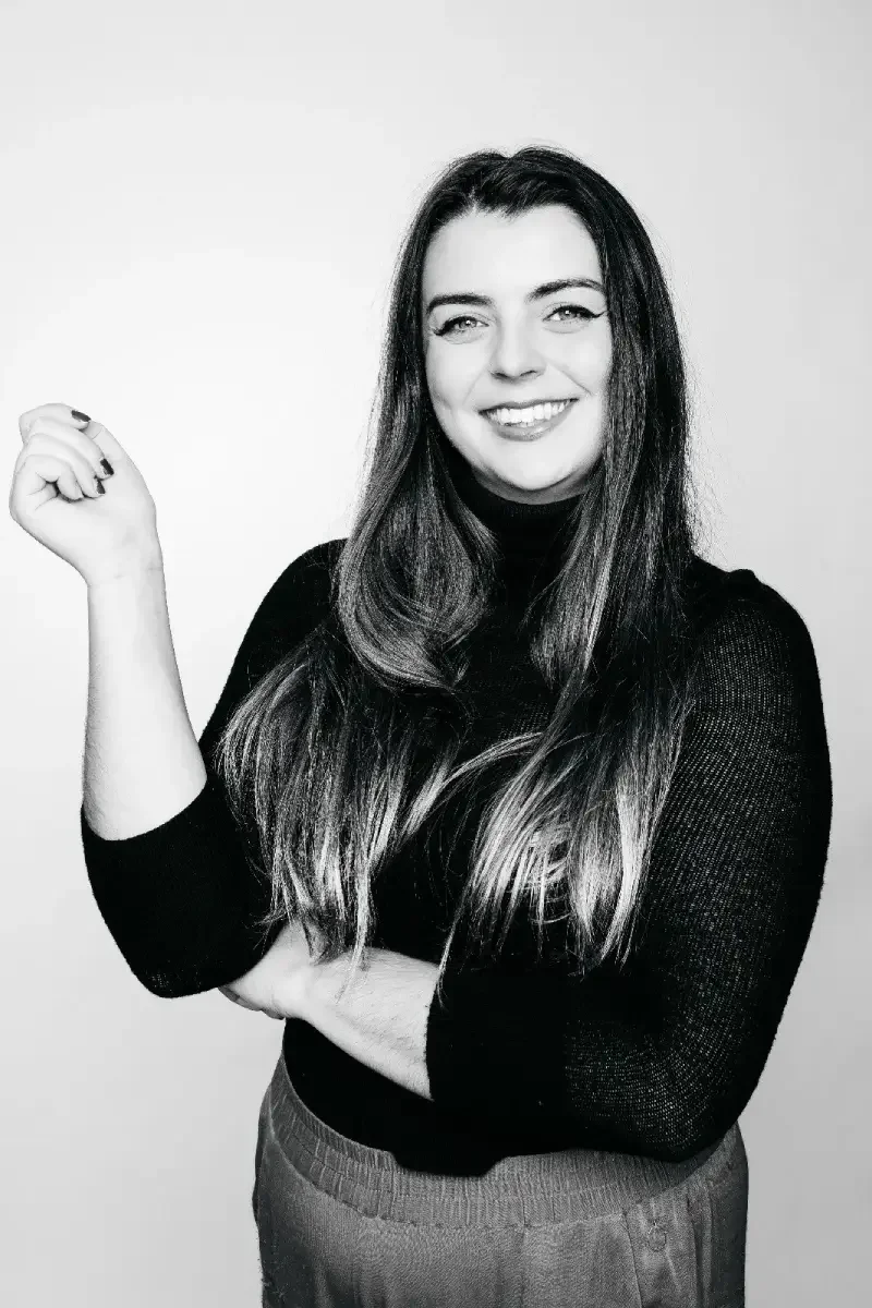 Grace Roberts, international marketing expert and Co-founder of SproutOut Solutions in a formal black and white setting