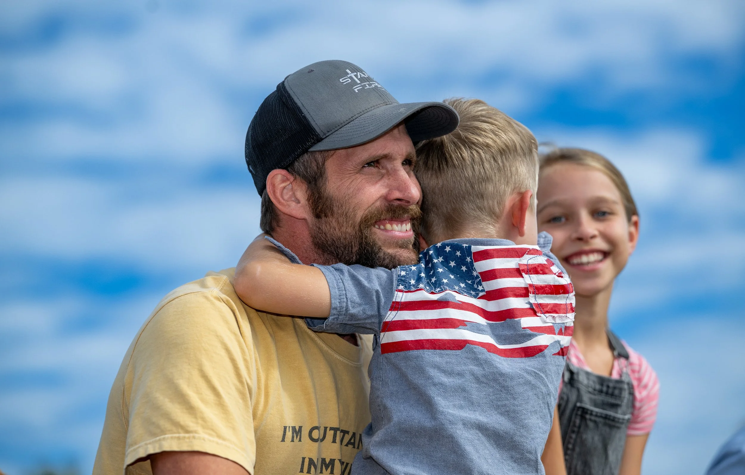 little boy flag shirt smiling family HUT_0629.JPG