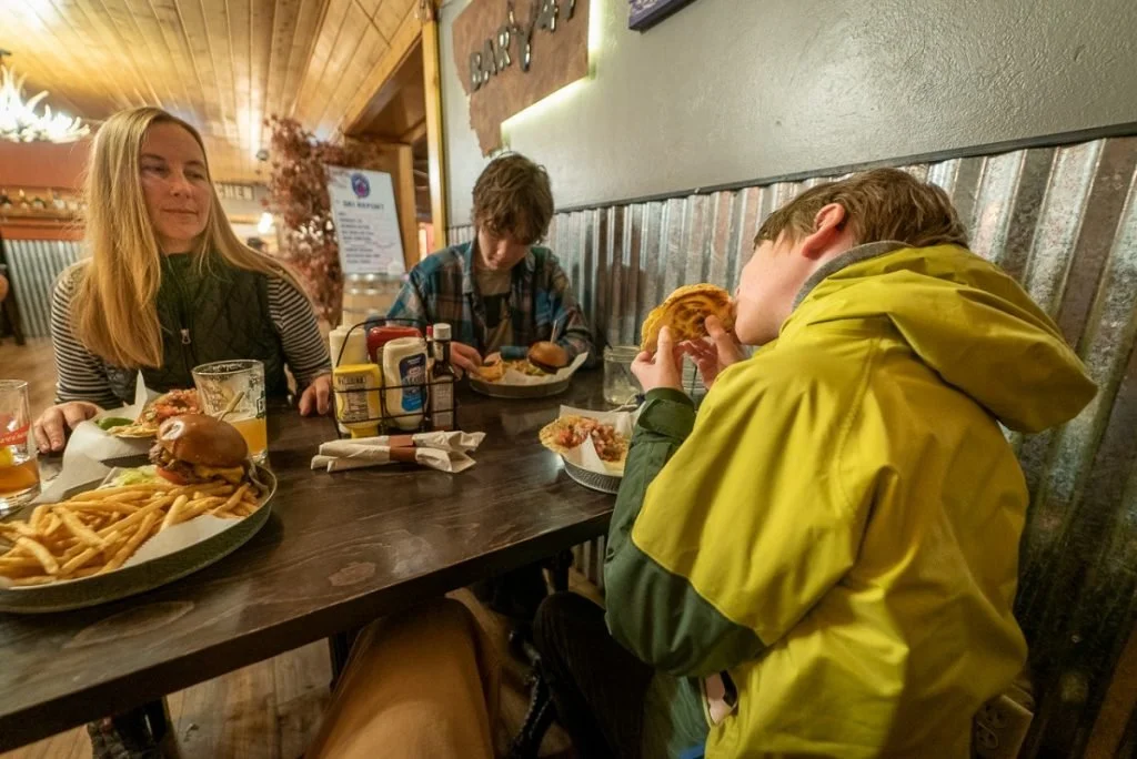 A well-earned burger at Bar 47 in White Sulphur Springs after Hiking Elephant Rock in the Little Belt Mountains. Photo © 2025 Melynda Harrison/TravelingMel