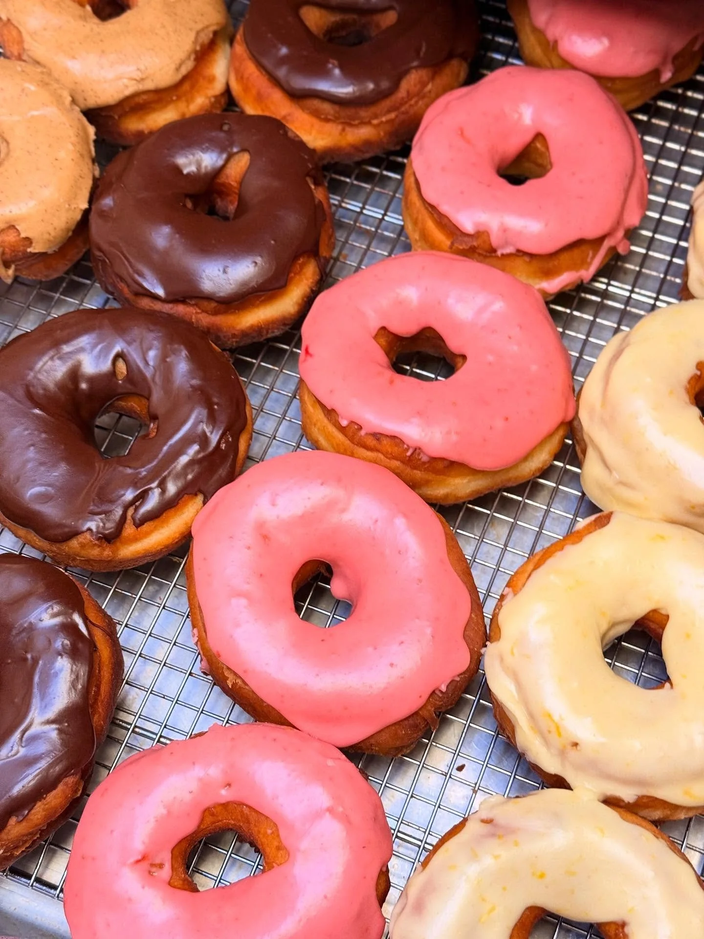 We make donuts. Every. Single. Day. 🍩✨
Delicious, fluffy, sweet brioche donuts&mdash;rolled, fried, and frosted fresh in-house every morning.

Current frostings:
🍫 Chocolate
🍓 Strawberry
🍊 Orange Miso
☕ Espresso Tahini
🍁 Maple Butternut
🍯 Honey
