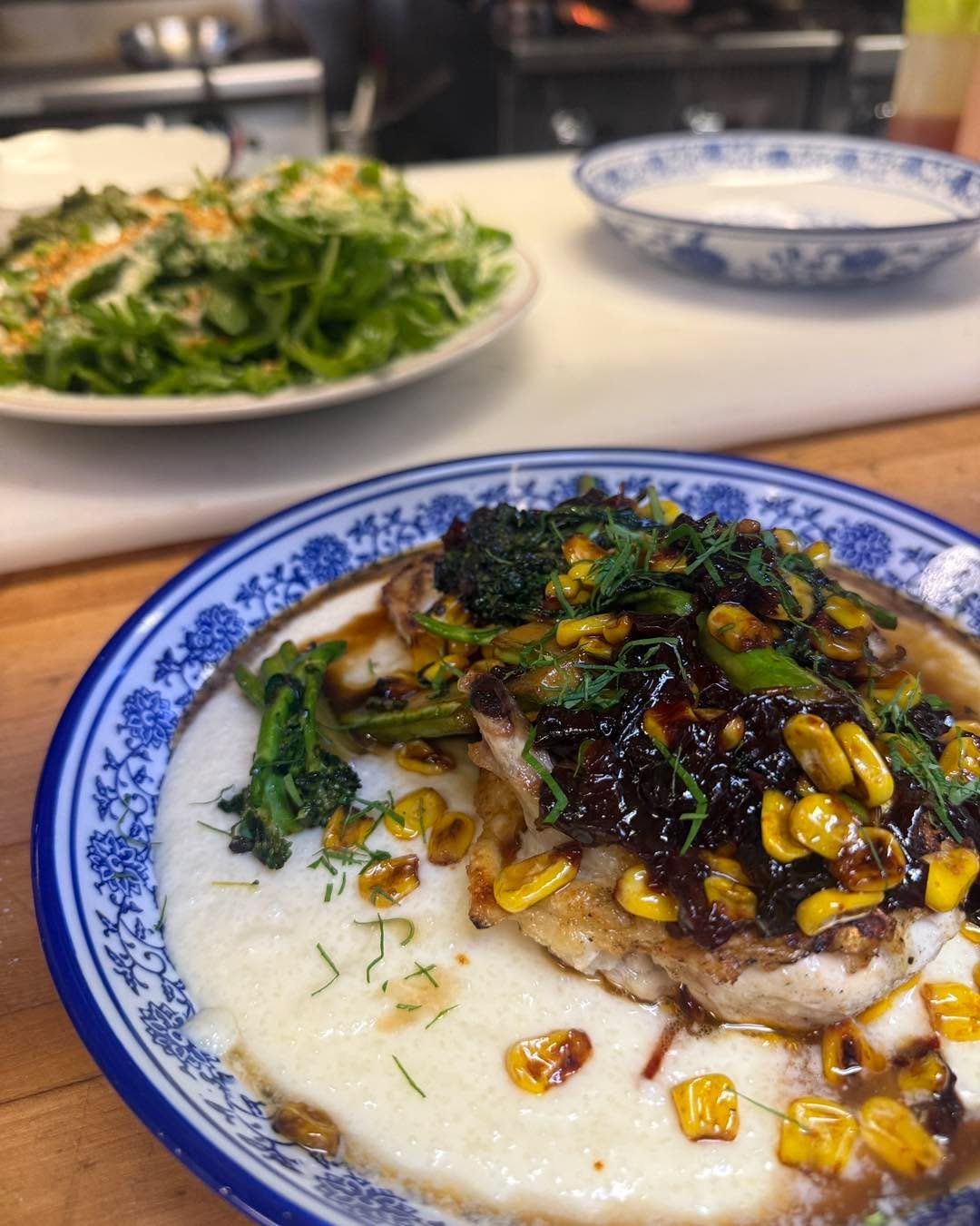Some things stay steady, even as the seasons change. This grilled half chicken feels like that &mdash; always familiar, always a little different, always right.

📸 parmesan polenta, broccolini, blistered corn, red pepper agrodolce&hellip; with fried