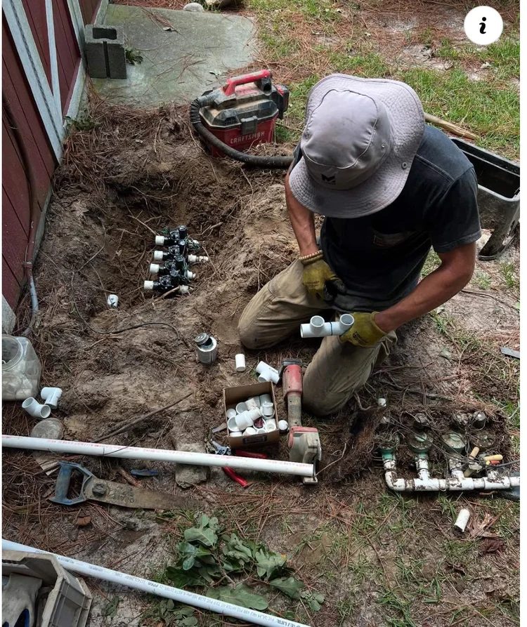 Technician working on a valve manifold