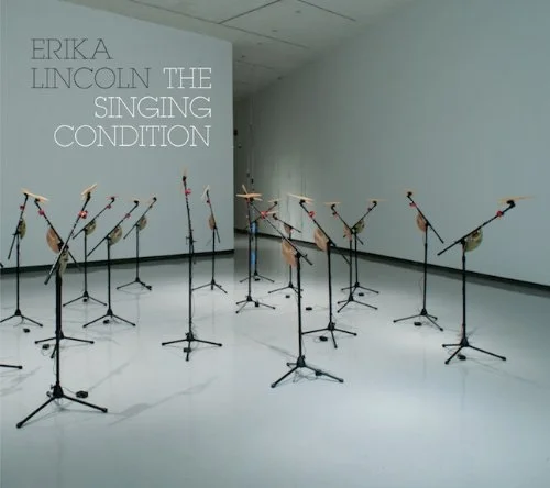 Cover page of an Exhibition Catalogue titled 'Erika Lincoln The Singing Condition.' Cover photo shows mechanical sculptures of birds made from microphone stands, electronics and clamps.
