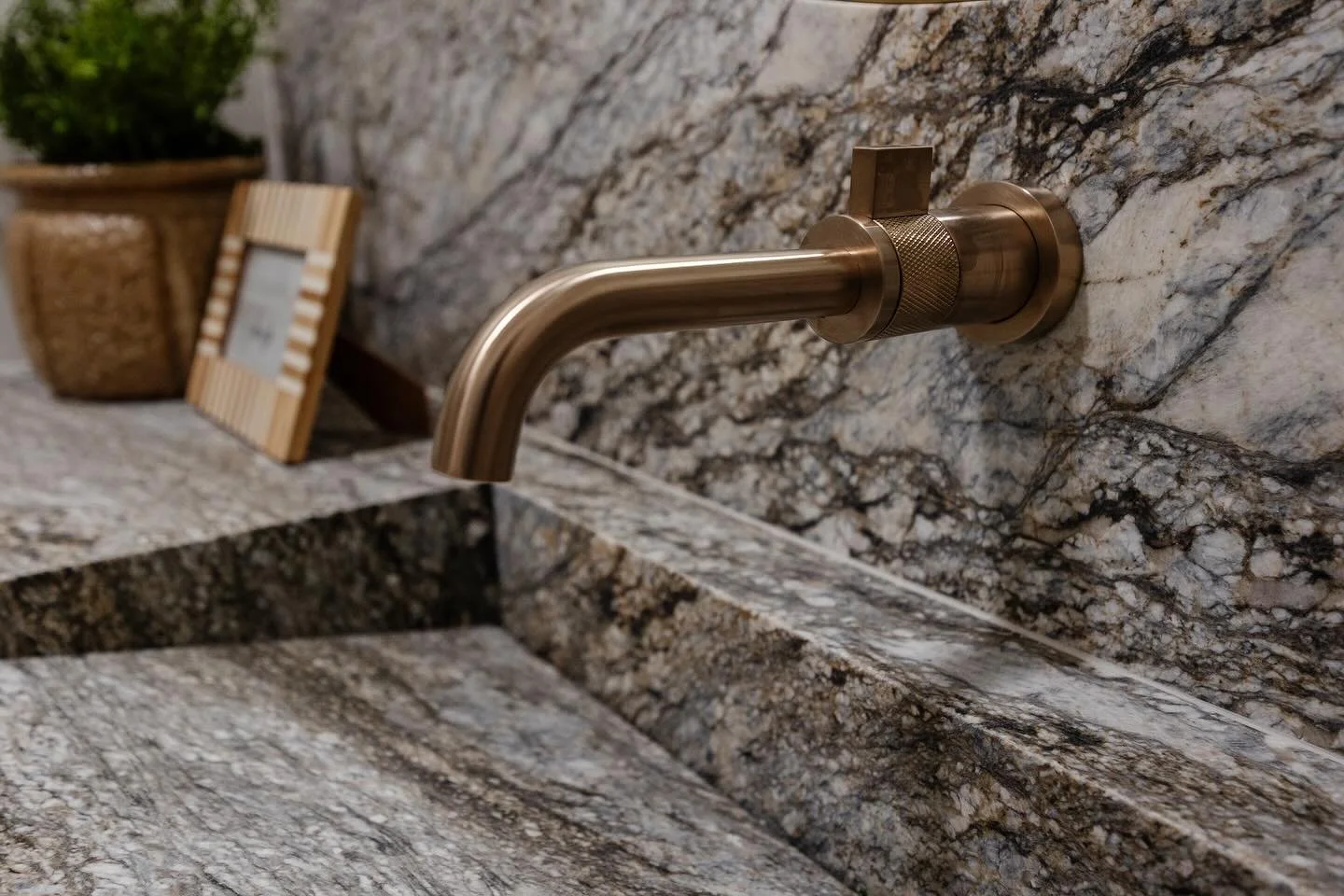 Renaissance Fabrication's integrated sink with granite wall mount and faucet