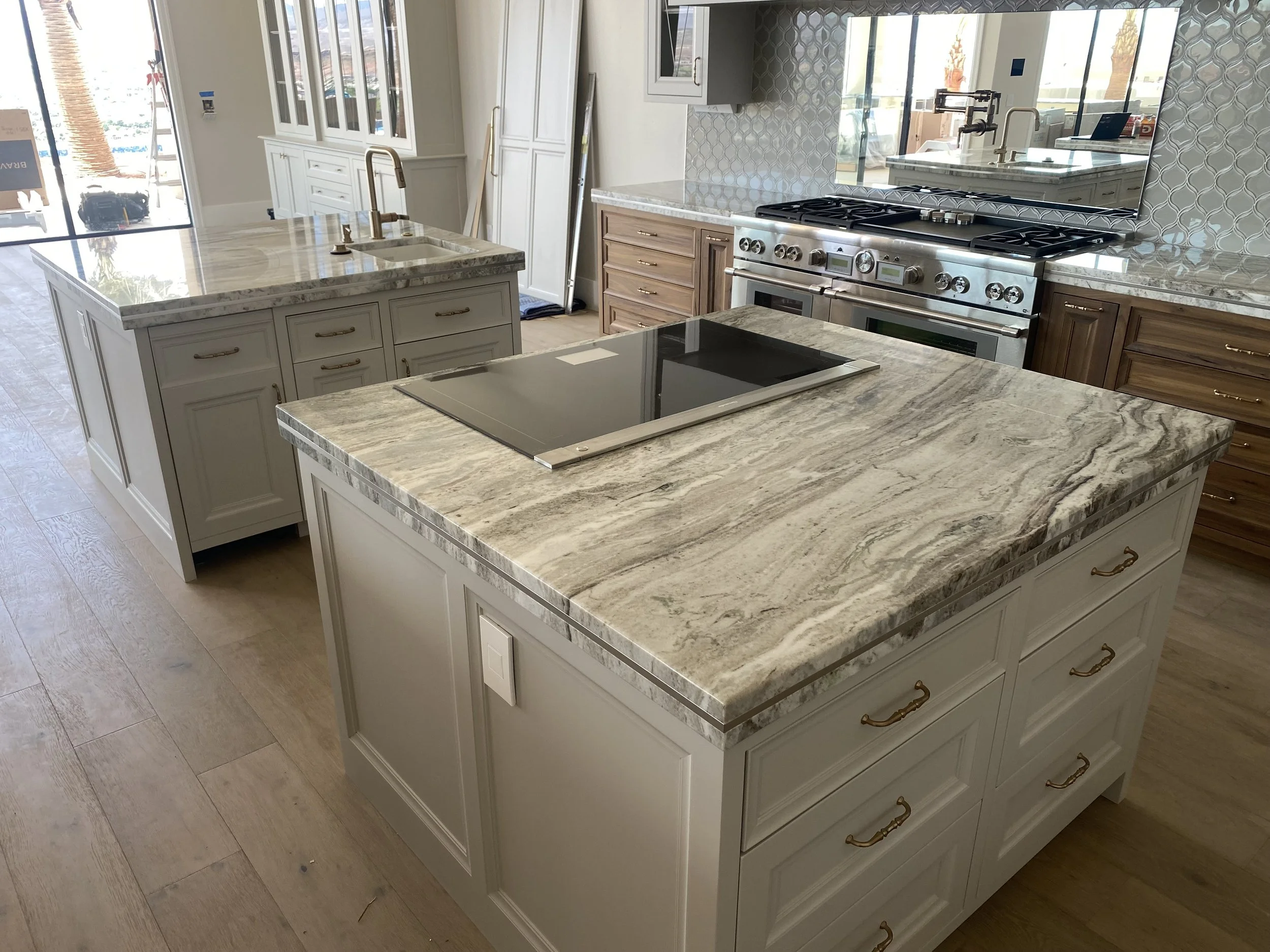 Kitchen with granite countertops and metal inlay edges