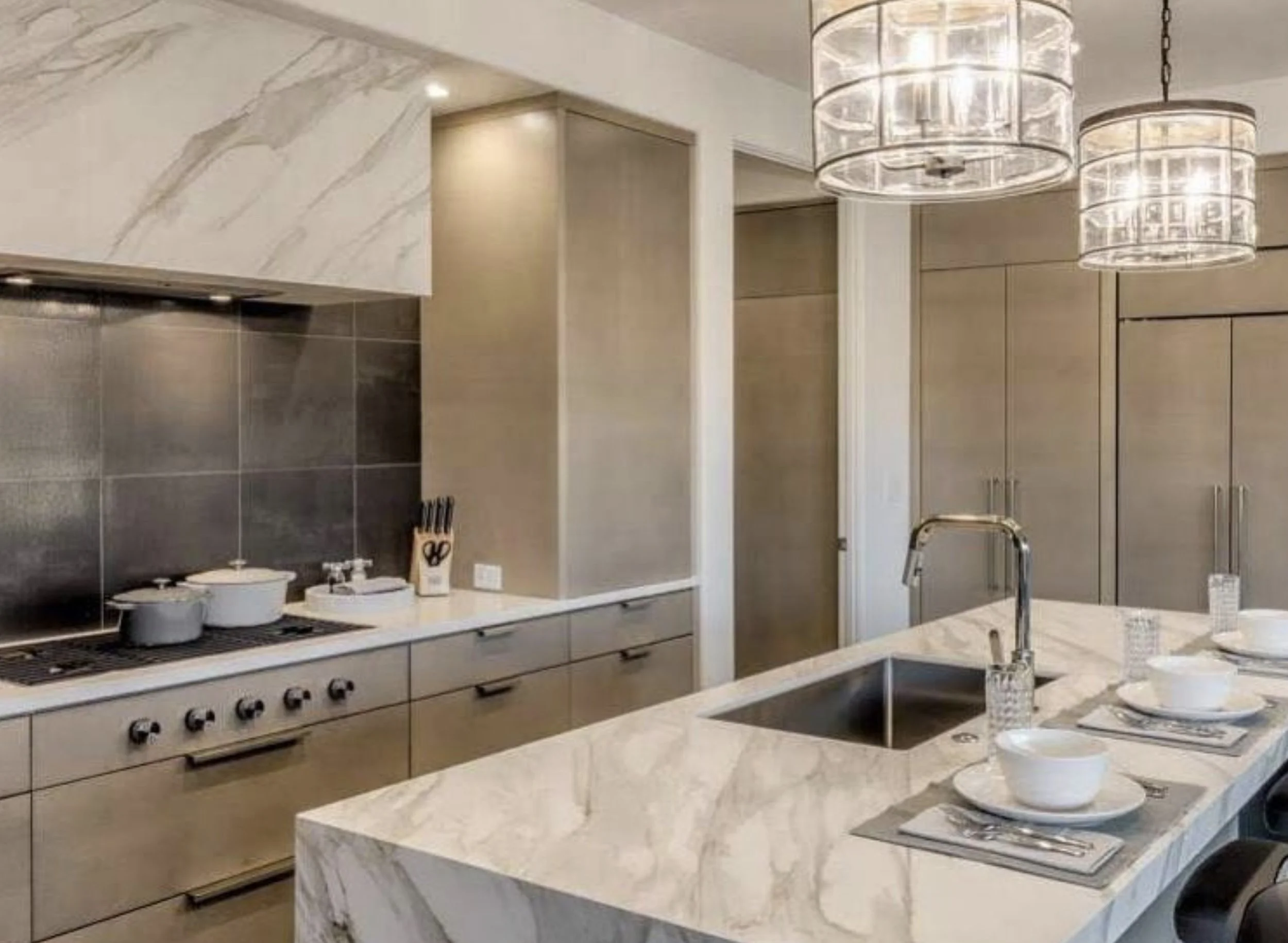 Neolith kitchen and hood with waterfall legs and mitered edges