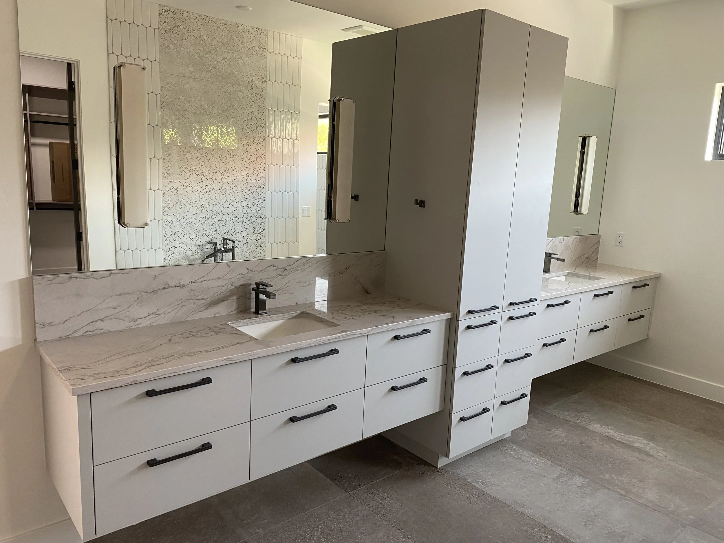 Primary bath with quartzite countertops
