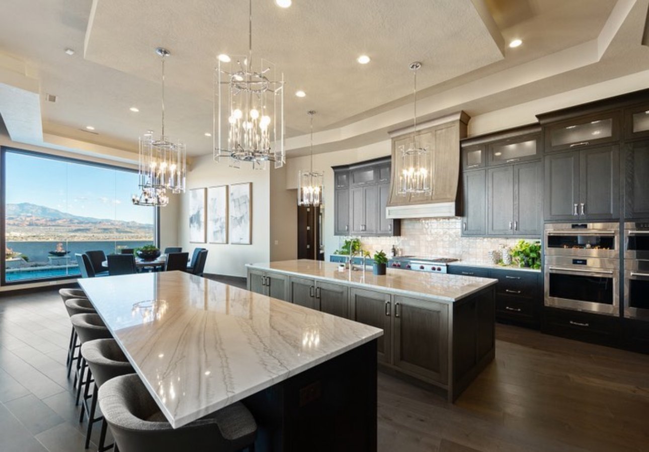 Renaissance Fabrication's Kitchen with Quartzite countertops on the table, island and kitchen countertop