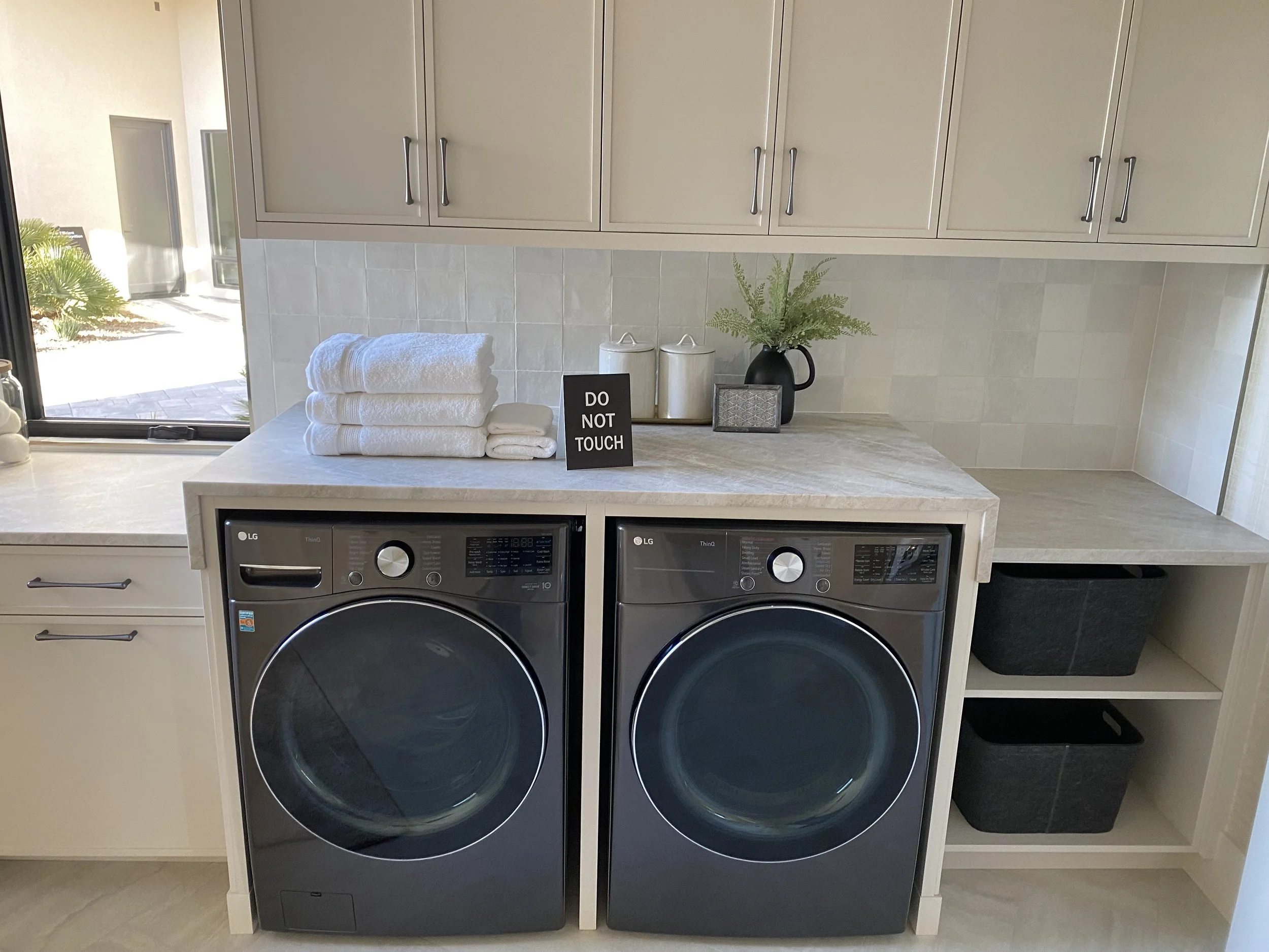 Laundry room with quartzite countertops