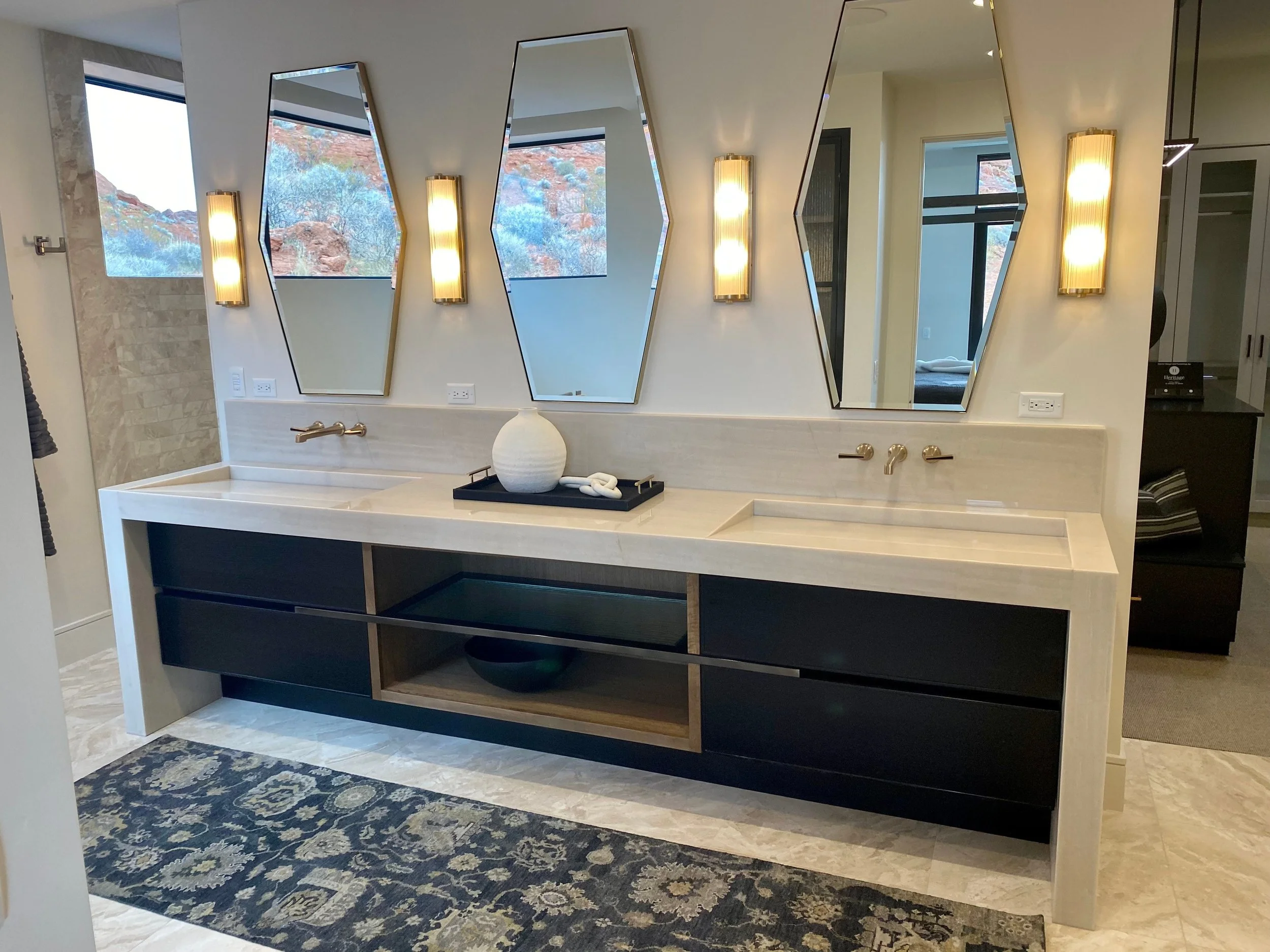 Renaissance Fabrication Primary bathroom with Quartzite, integrated sink with waterfall legs