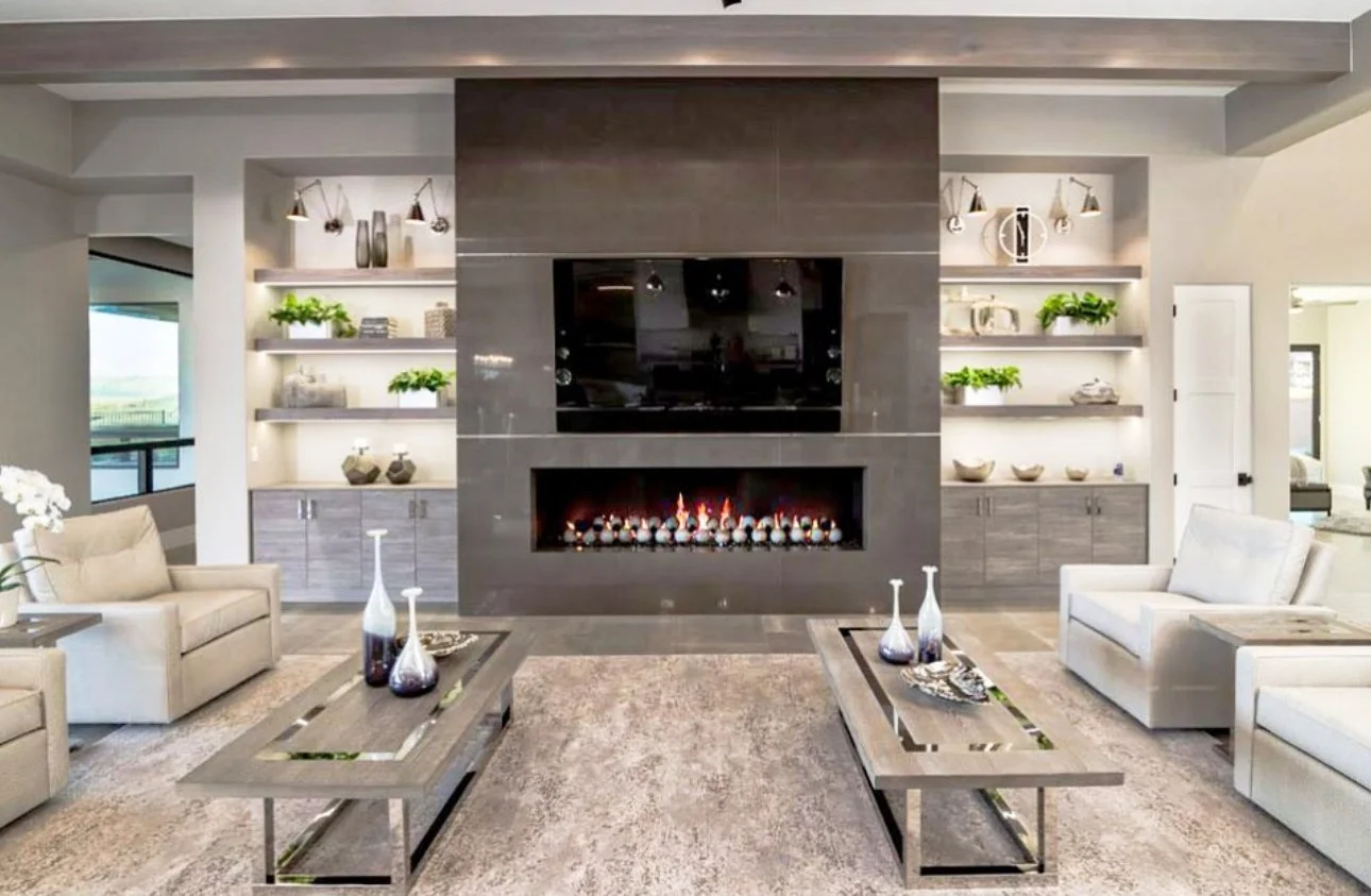 Renaissance Fabrication's Living Room with Electric Fireplace made of neolith, Chairs and Tables