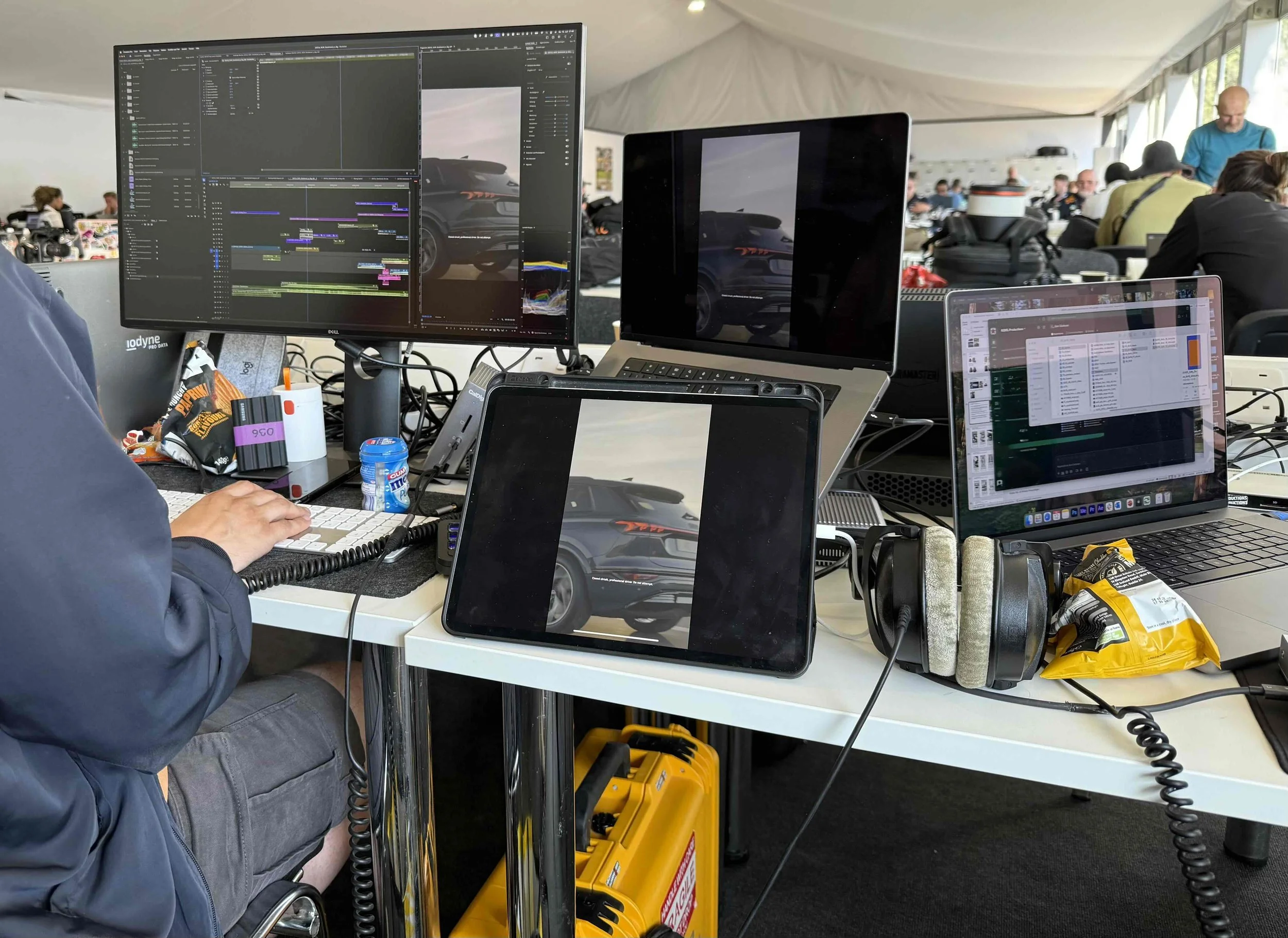 Busy edit desk in the media centre as we edit content live on the ground