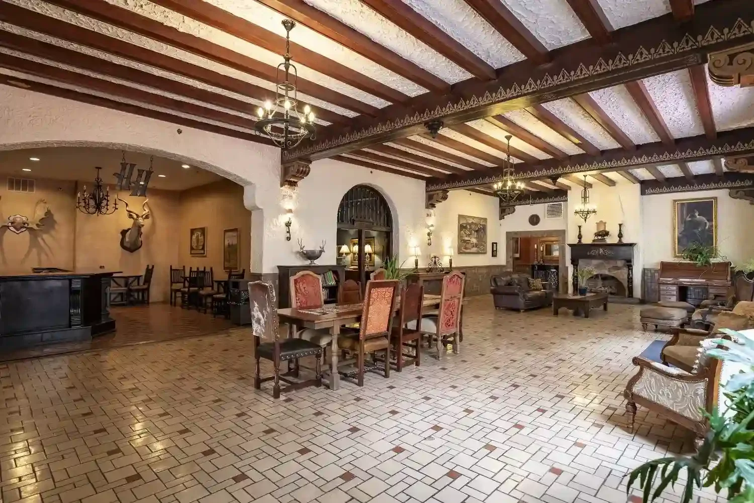 The Grand Lobby inside Holland Hotel was designed by Henry Trost and has high ceilings, ornate woodwork, and an amazing atmosphere to host all kinds of events.