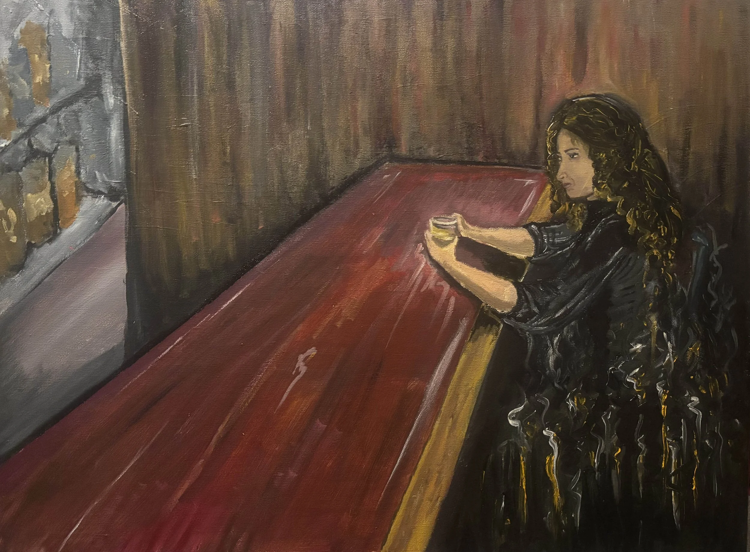 Painting of a person with short dark hair sitting at a red table, holding a glass of drink, with a textured background.