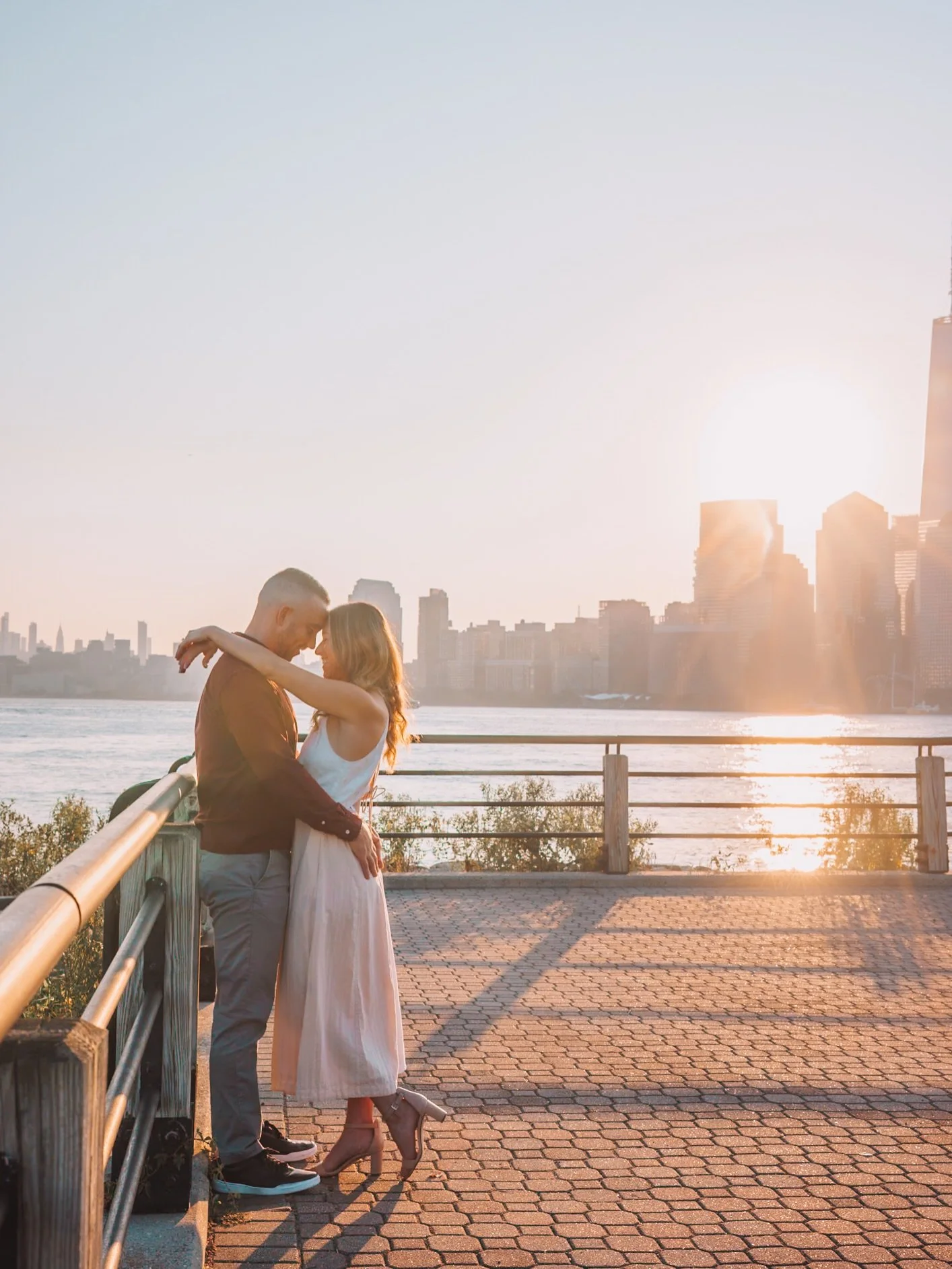 A city silhouette, warm tones, and two lovebirds? What else could you ask for in an engagement shoot? Congrats to S &amp; P! 🌇❤️
.
.
.
#NJWeddingPhotographer #NJEngagement #EngagedNJ #NewJerseyBride #EngagementSession