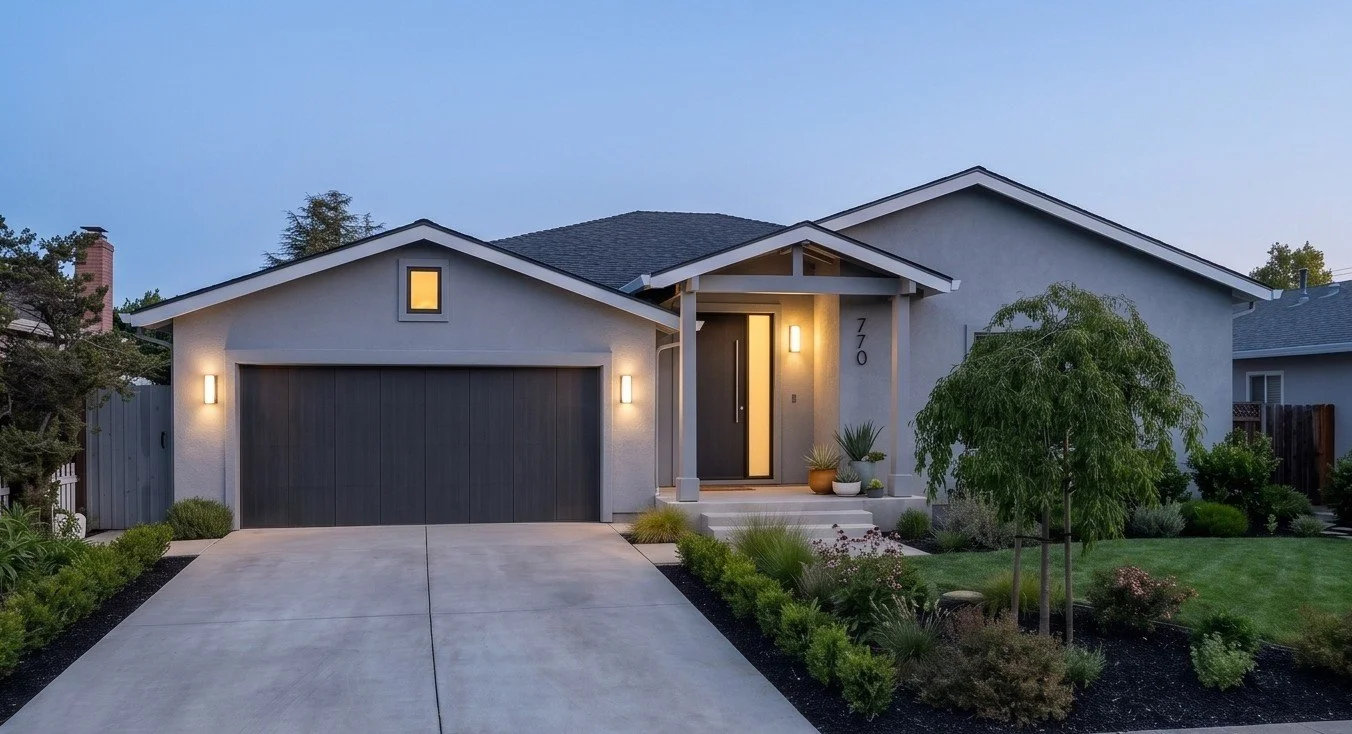 Exterior front: Street-facing view of gabled roofline with entry porch feature on renovated Mountain View single-family home