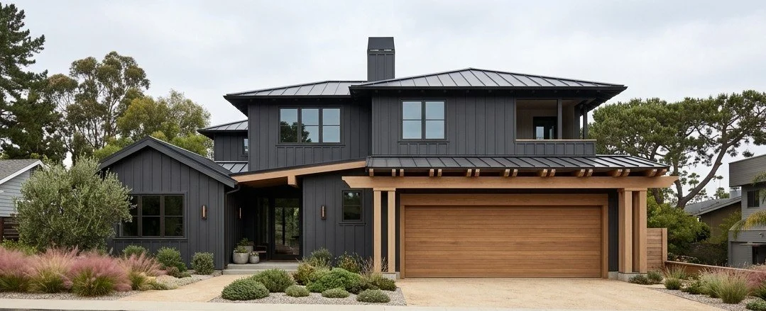Front exterior of a two-story modern custom home with dark vertical board-and-batten siding, gabled rooflines, and warm wood accents in Menlo Park