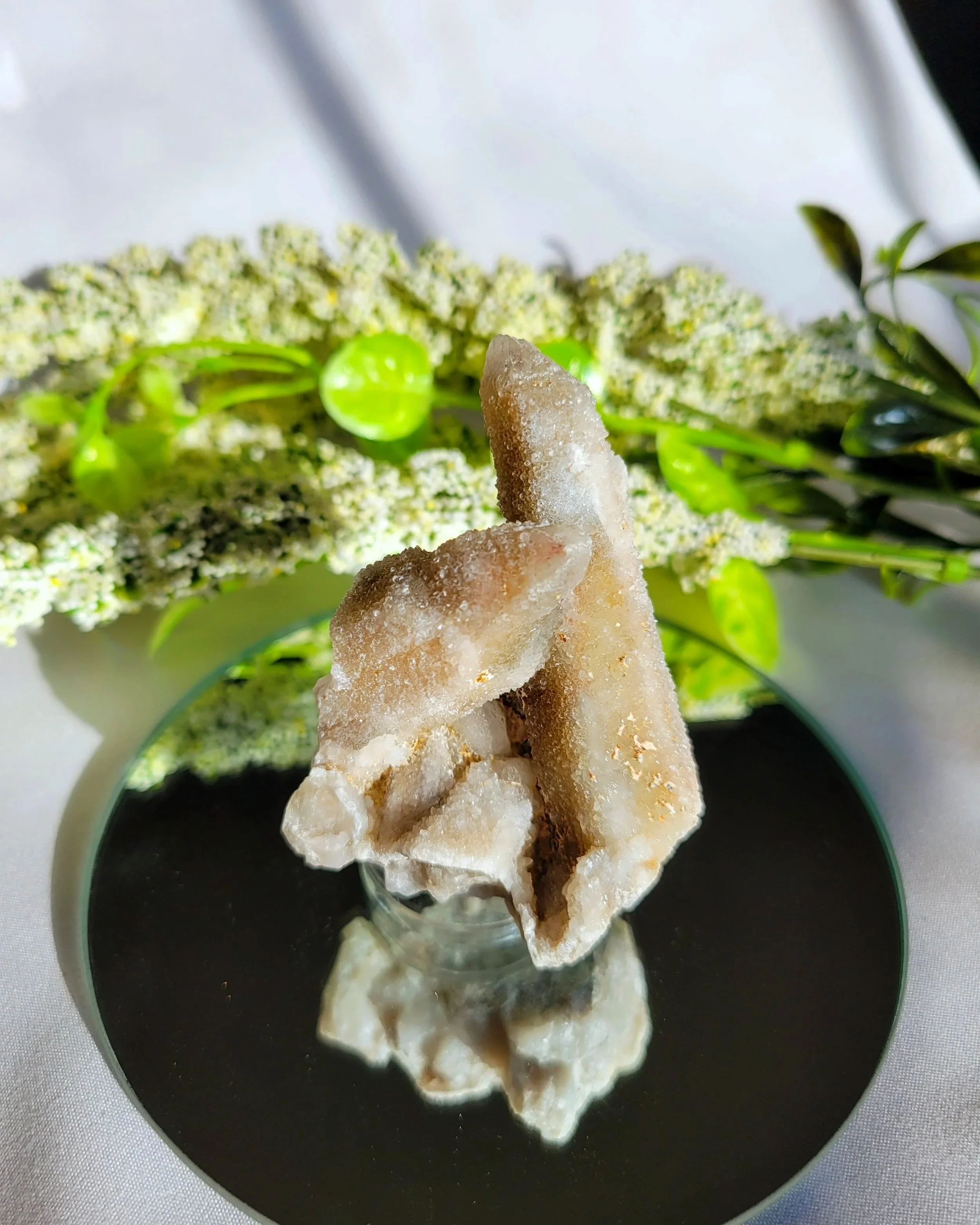 Light pink and white sparkly crystal made of spirit quartz