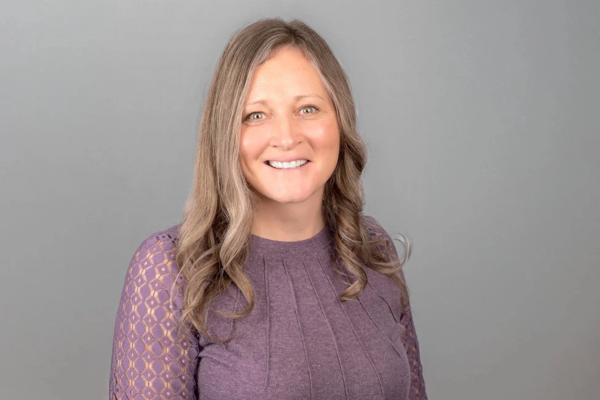 Shannon Freeman, Family Law Legal Assistant - A professional headshot photo of Shannon smiling.