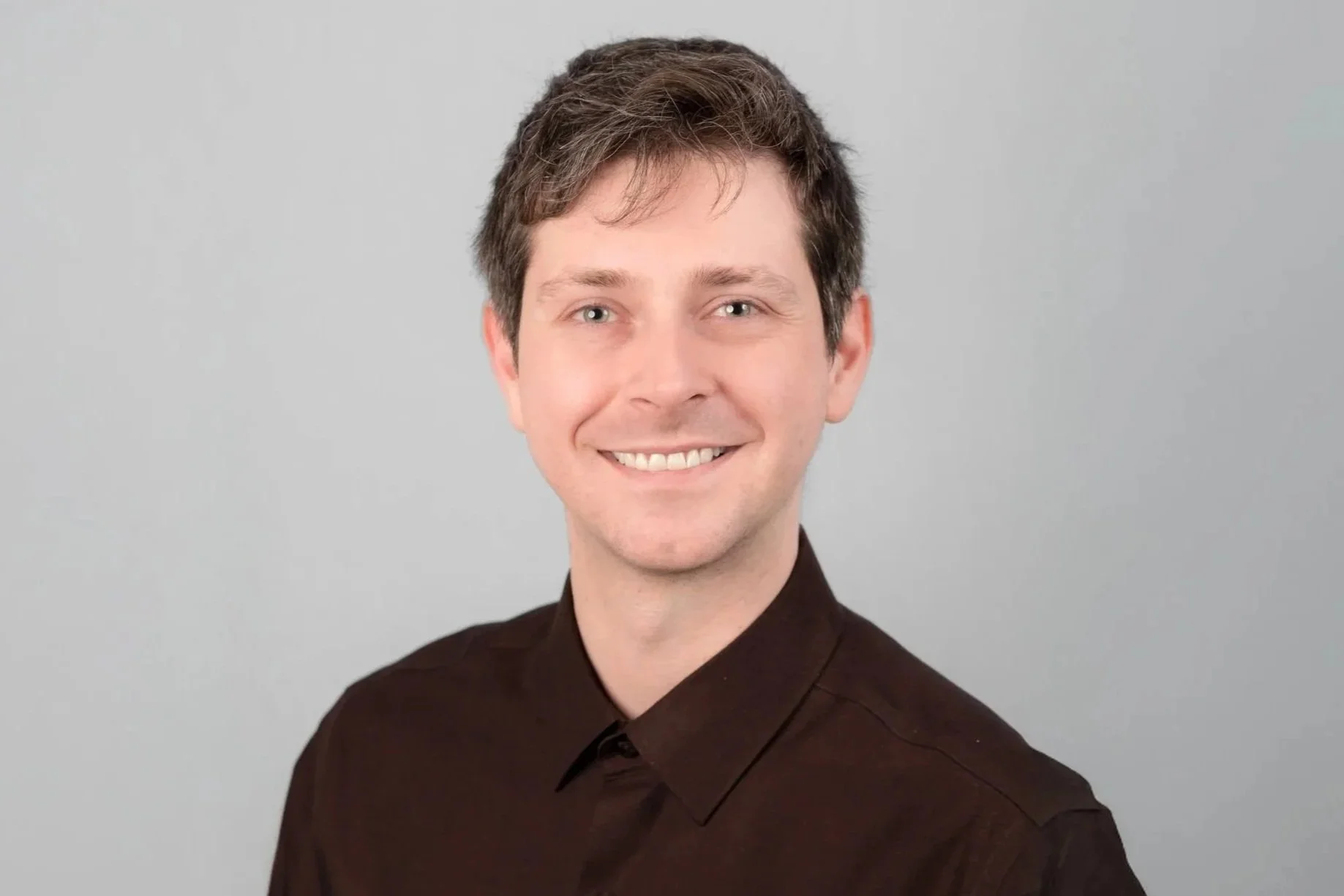 Tyler Wilson, Assistant Intake Coordinator at Drake Law - A professional headshot of Tyler smiling.