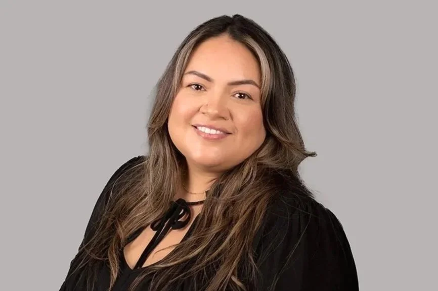 Jazmin Klassen, Senior Family Law Clerk at Drake Law Family Lawyers in London - A professional photo of Jazmin, in formal attire, smiling.