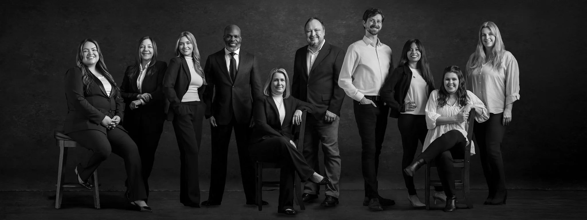 Black and white group photo of the Drake Law law clerks and the leadership team.