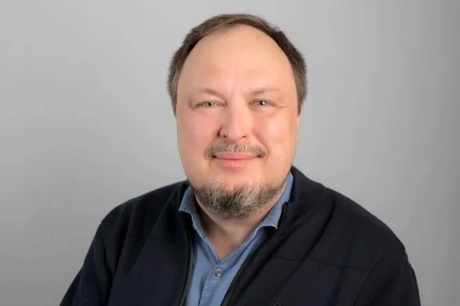 Mike C., Web Technology & Communications Specialist, a professional headshot.