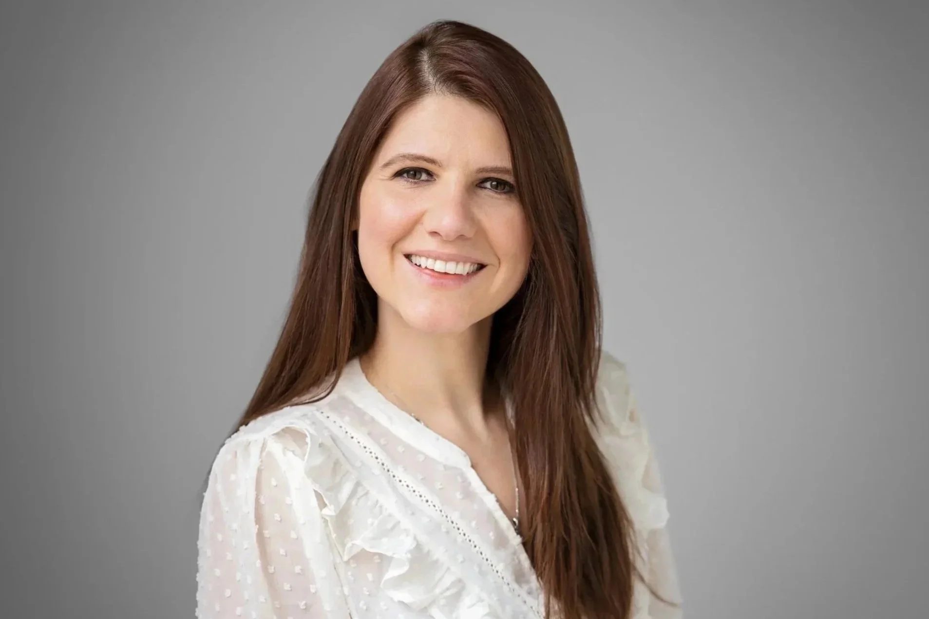 Evgenia Karakehayova, Associate Lawyer - Family Law. A headshot photo of Evgenia smiling. 