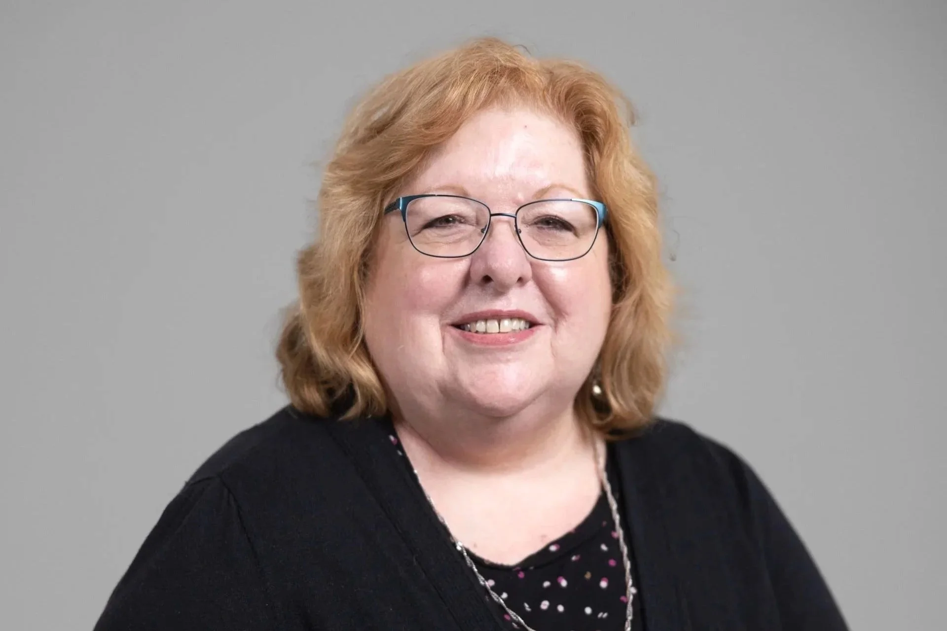 Professional headshot of Elizabeth Levy-Mortlock, Senior Real Estate Clerk at Thomas Bates Law, a Drake Law Group affiliate.
